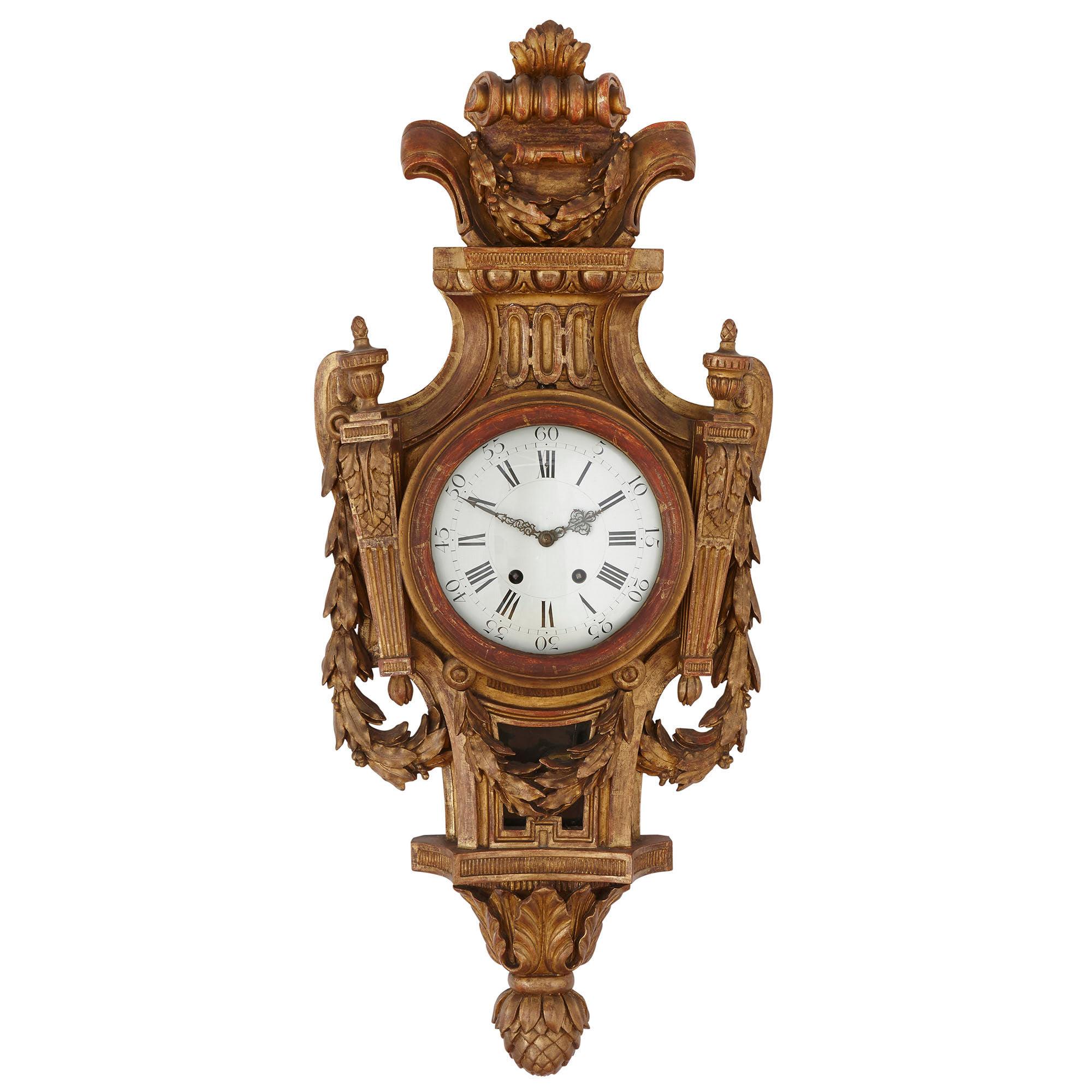 Rare neoclassical style French giltwood clock and barometer set
French, 19th century
Measures: Height 90cm, width 38cm, depth 12cm

This duo comprises a wall clock and barometer, both of which are crafted from giltwood in the Louis XVI style.