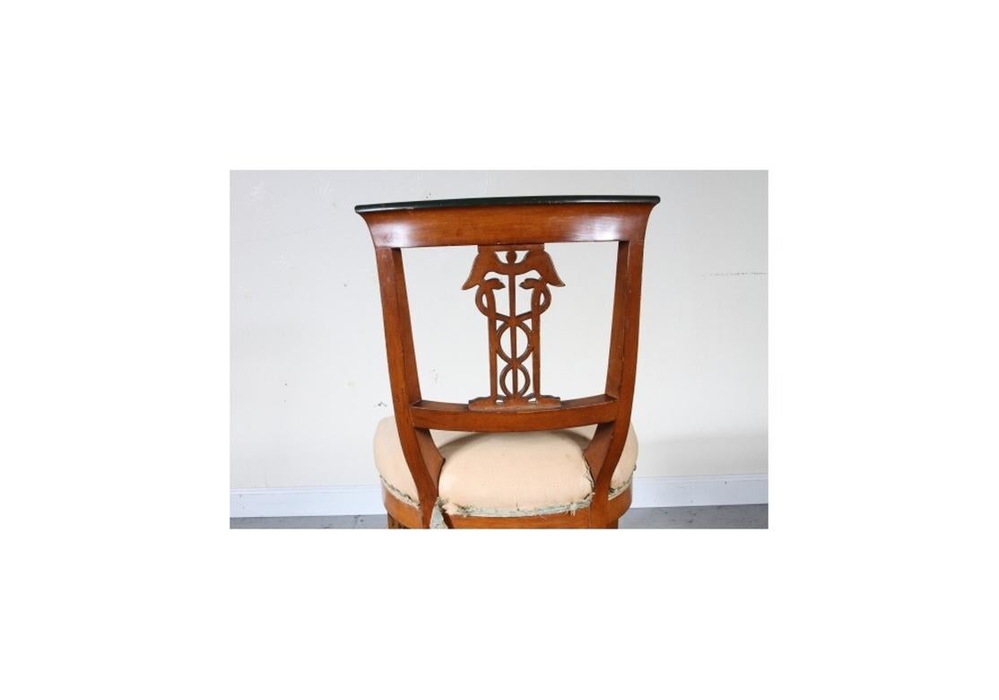 Very rare caduceus carved back to a traditional neoclassical style side chair. The richly historical and ancient Caduceus symbol features well carved wings and the two Classic intertwined facing snakes. Horseshoe shaped upholstered seat with