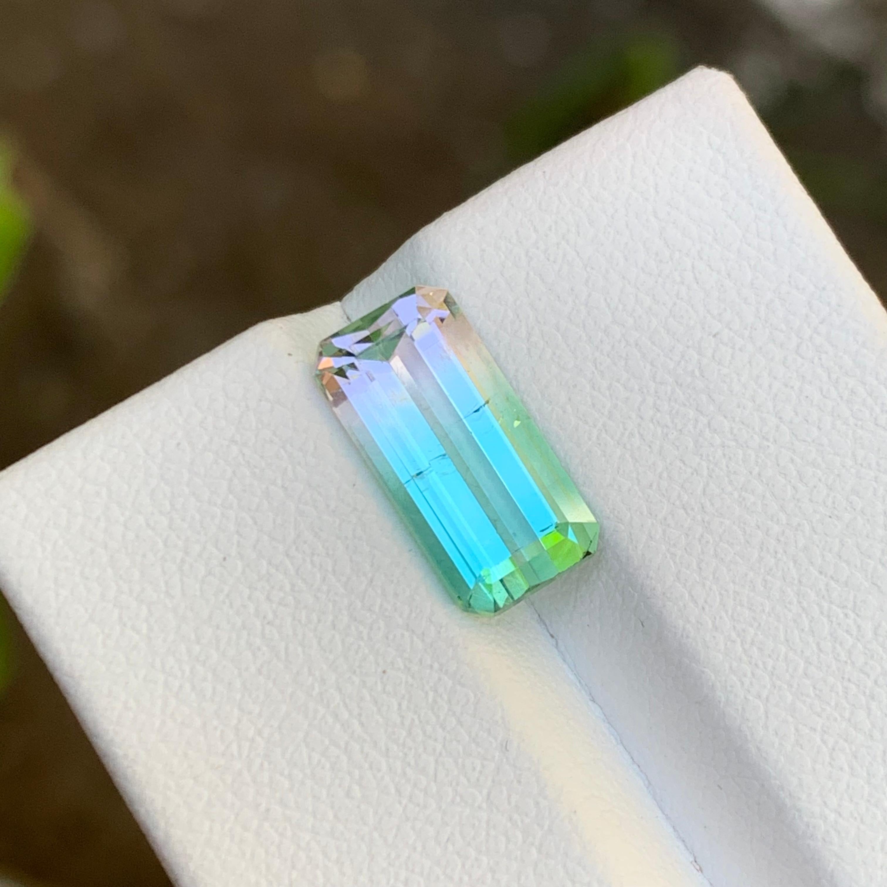 Contemporary Rare Neon Bluish Green and Pink Bicolor Tourmaline Gemstone, 3.95 Ct Emerald Cut For Sale