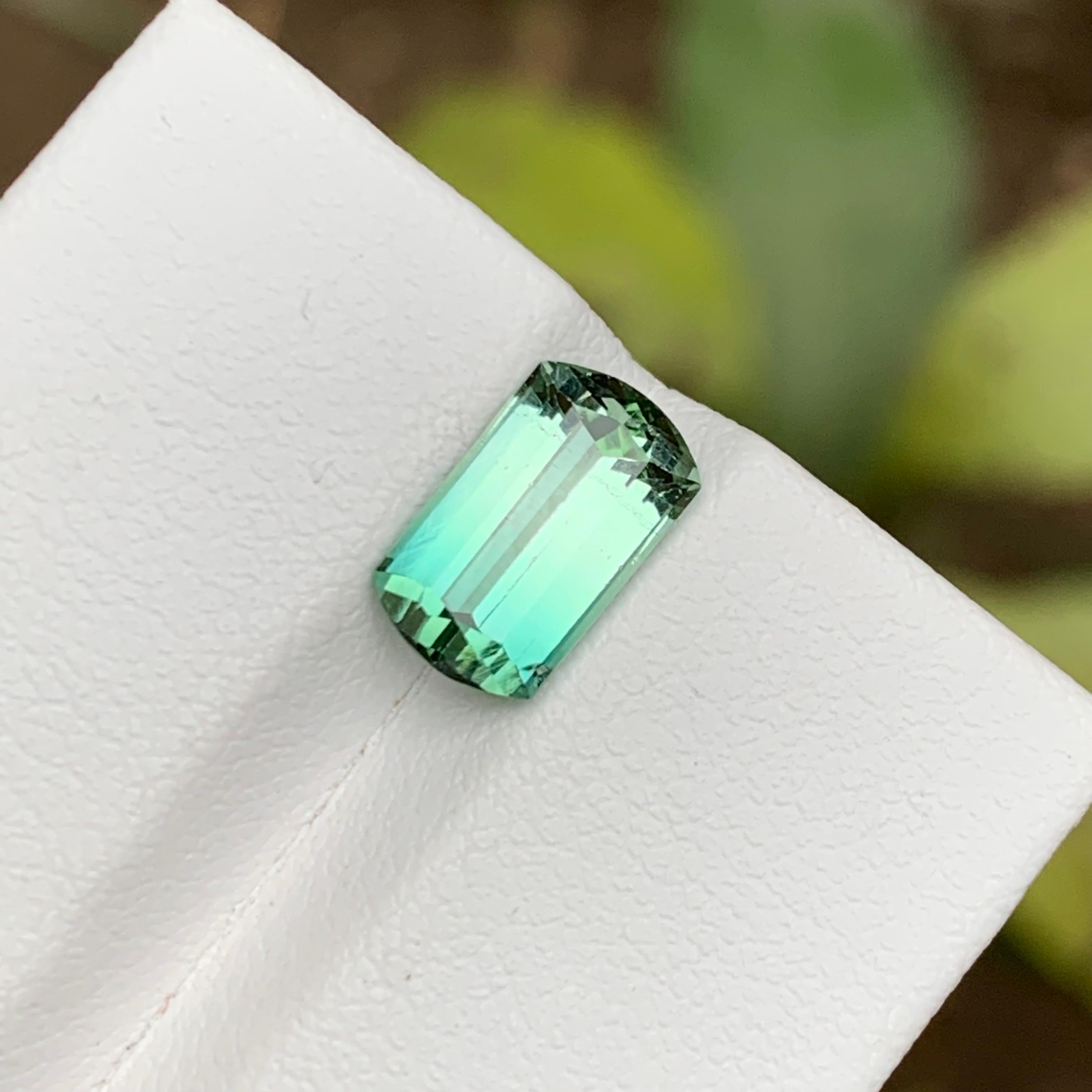 GEMSTONE TYPE: Tourmaline
PIECE(S): 1
WEIGHT: 2.50 Carat
SHAPE: Modified Step Emerald Cut
SIZE (MM):  10.16 x 6.01 x 4.87
COLOR: Bicolor
CLARITY: Approx 98% Eye Clean
TREATMENT: Not Treated
ORIGIN: Afghanistan
CERTIFICATE: On demand 

Captivating
