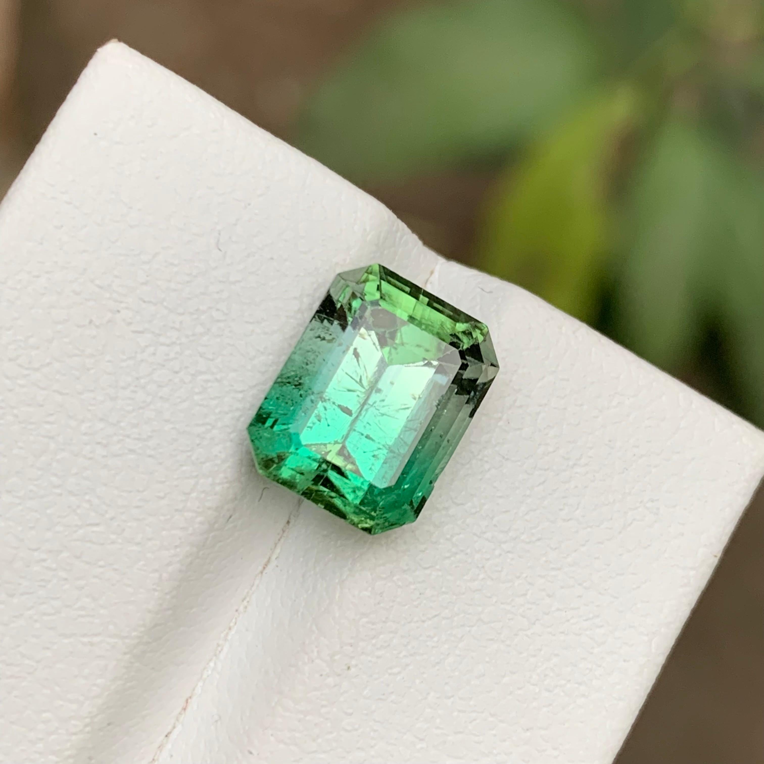GEMSTONE TYPE: Tourmaline
PIECE(S): 1
WEIGHT: 5.40 Carats
SHAPE: Step Emerald Cut
SIZE (MM): 10.60 x 8.35 x 7.38
COLOR: Bicolor 
CLARITY: Moderately Included 
TREATMENT: None
ORIGIN: Afghanistan
CERTIFICATE: On demand

Truly exquisite 5.40 Carats