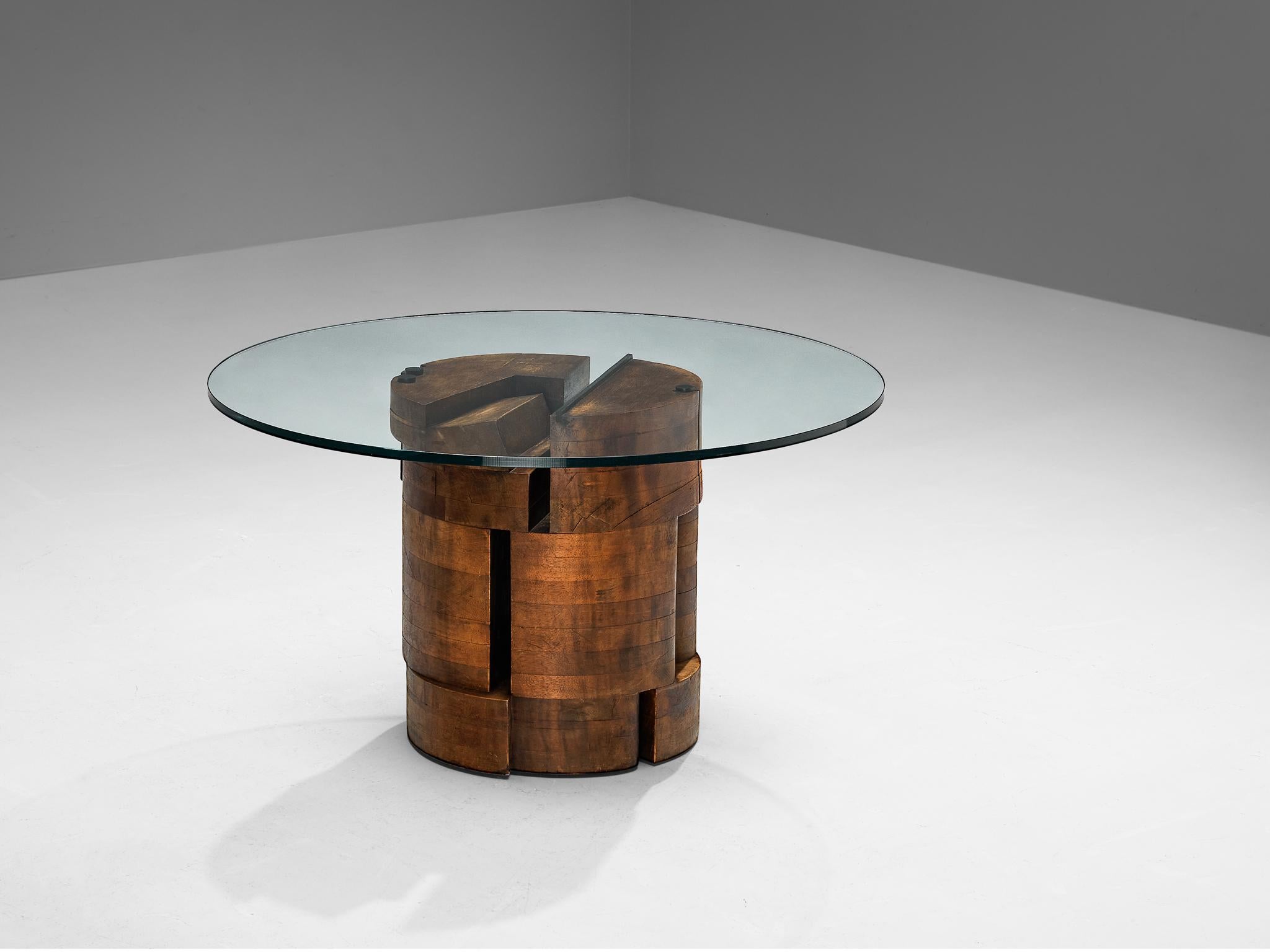 Nerone & Patuzzi for Gruppo NP2, dining table, walnut, glass, Italy, circa 1970

Conceived by the Italian designer duo Giovanni Ceccarelli and Giancarlo Patuzzi, this dining table undeniably stands as a piece of artistry in its own regard. It takes