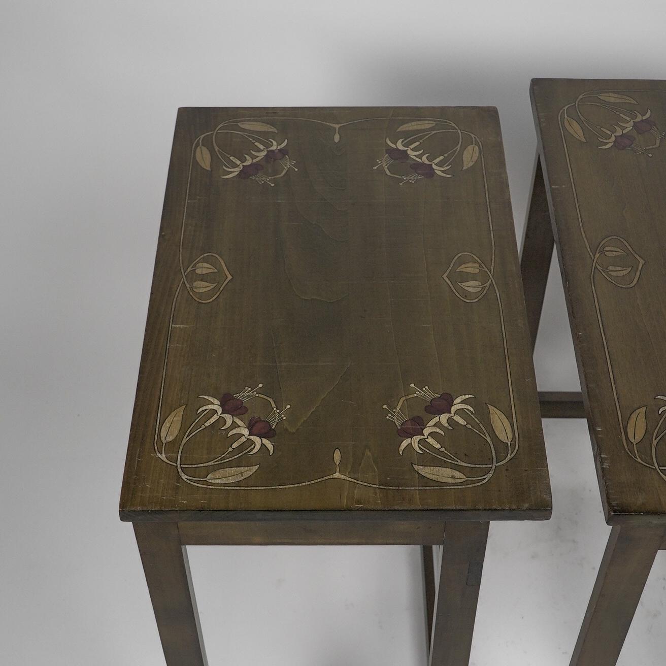 A nest of four side tables each top surface hand painted with floral decoration. For Sale 7