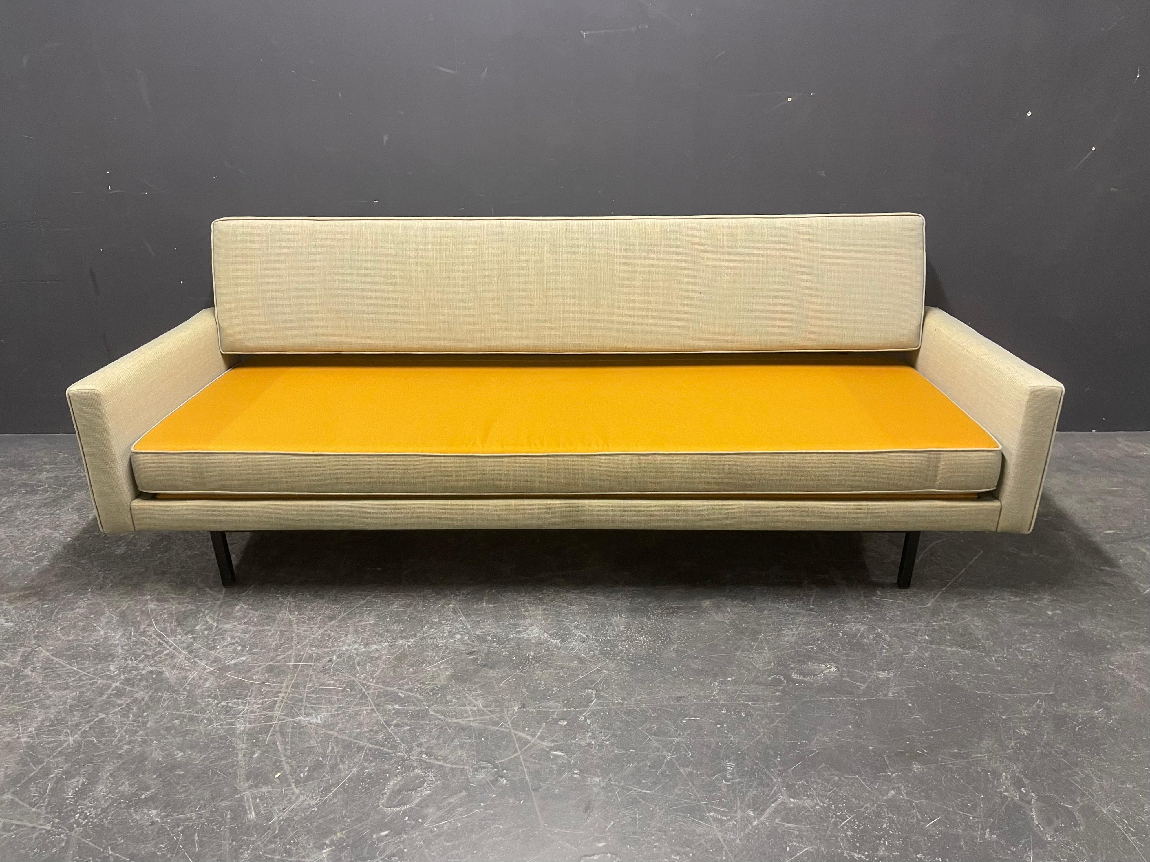 Convertible sofa designed by Richard Schultz for Knoll International. The seat pulls forward and up to create a flat and level bed. Wonderful and classic Mid-Century Modern design.