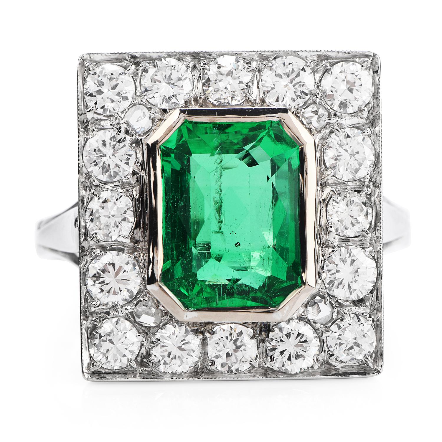 This Rare Emerald set inside a vintage late 1950's solid platinum mounting designed as a rectangular plaque, weighing approx 3.94 carats GIA certified to be without any treatments. This highly sparkling gem surrounded by 20 extra white