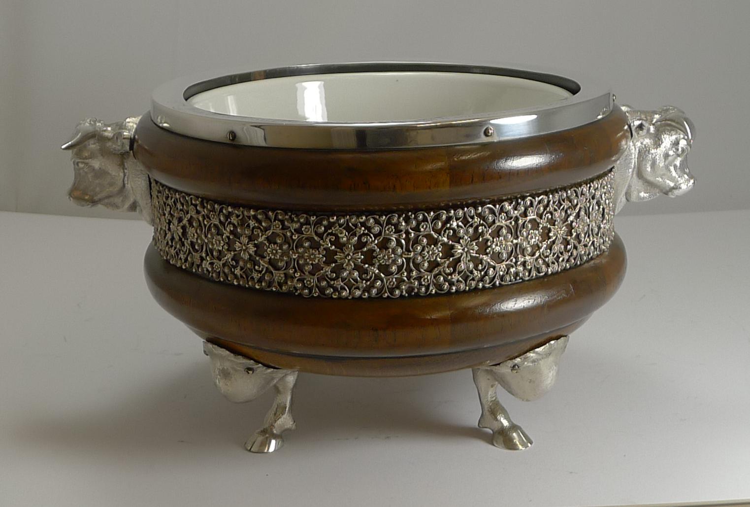 A rare and highly sought-after example of a Victorian salad bowl made from solid English Oak and silver plated fittings.

A large and heavy example the shaped bowl has been turned and decorated with a band of fine quality filigree around the