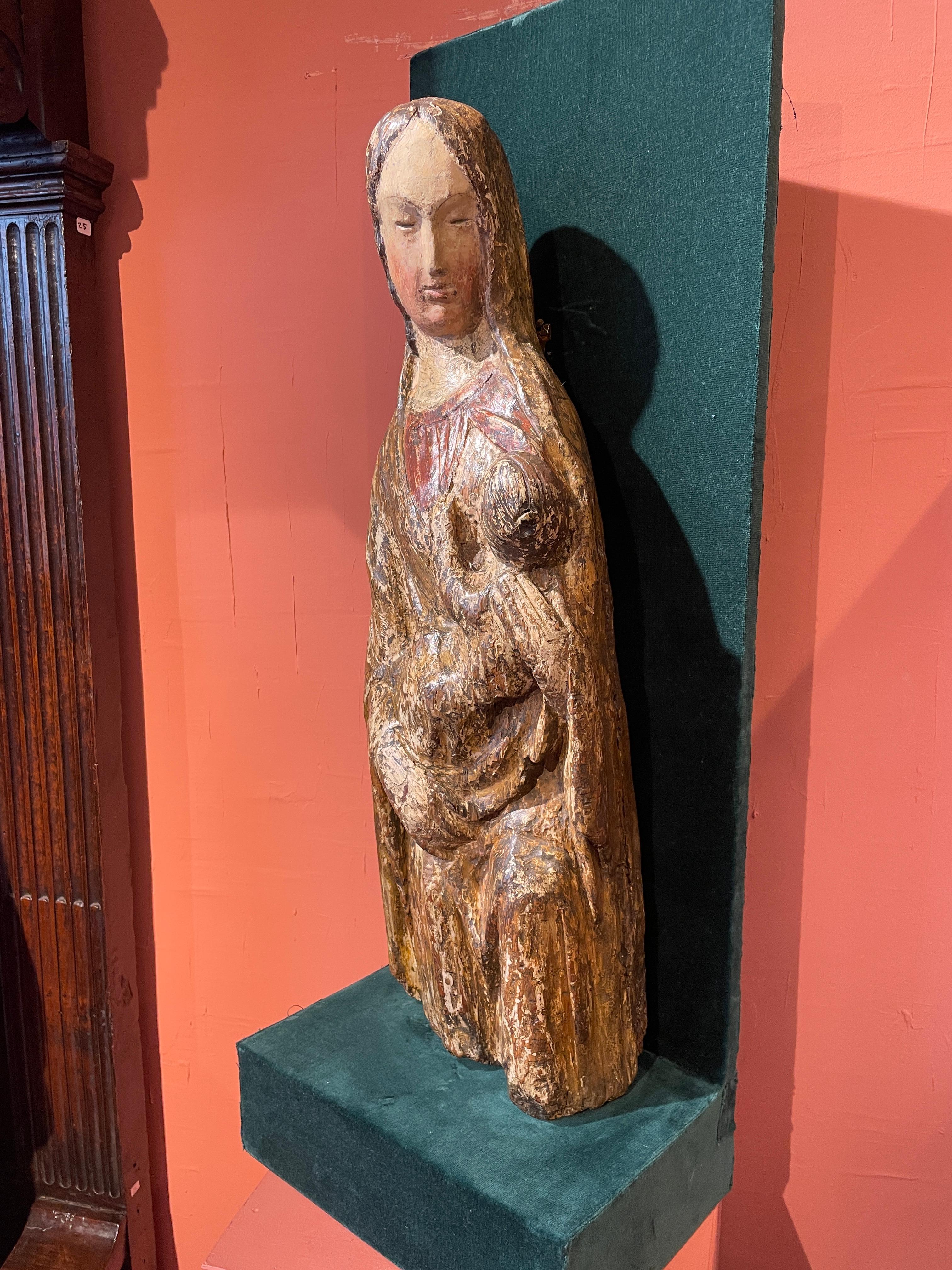 Hand-Carved Rare Nursing Virgin from the 14th century For Sale