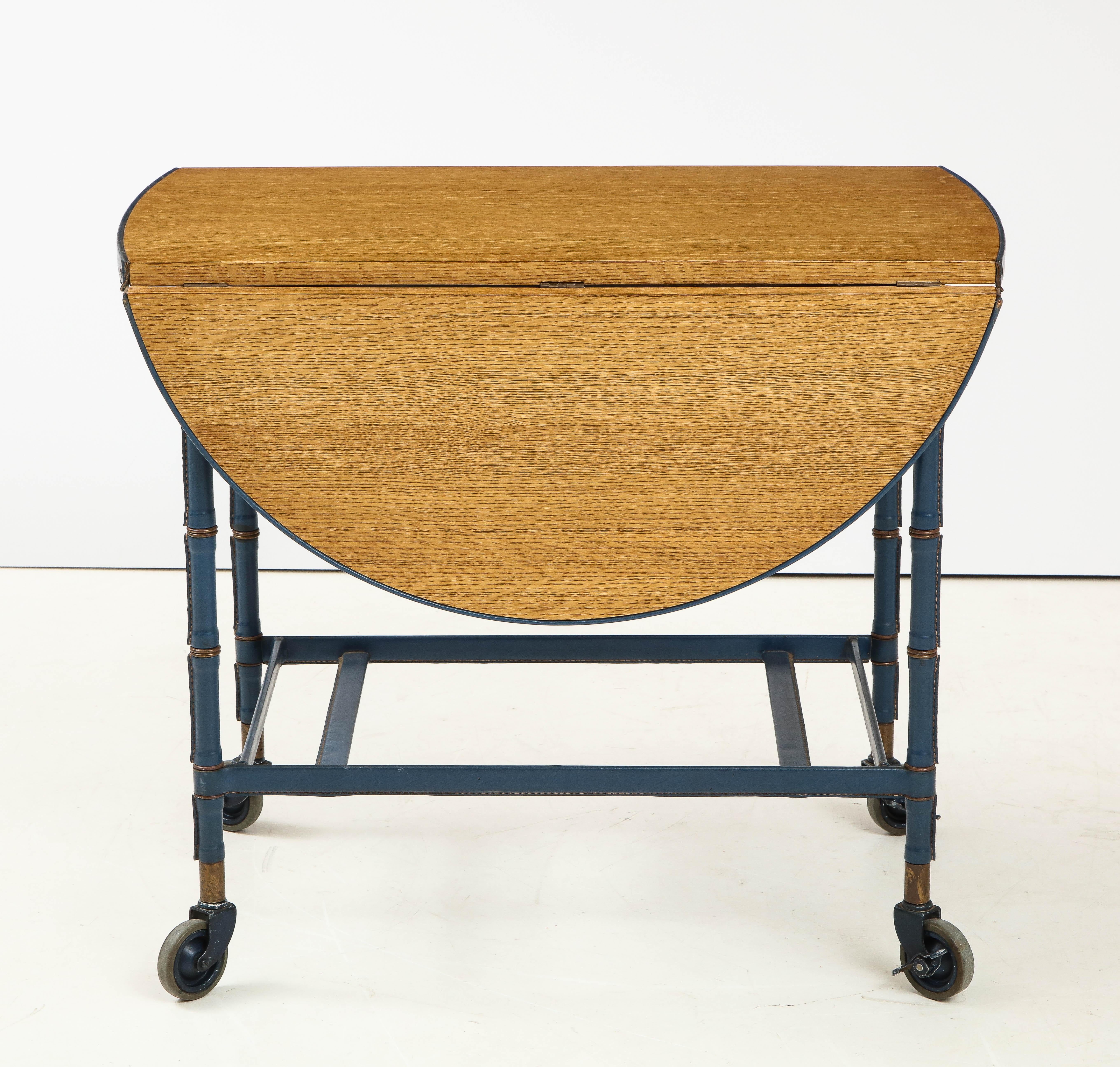 French Rare Oak and Blue Stitched Leather Drop-Leaf Table / Bar Cart by Jacques Adnet For Sale