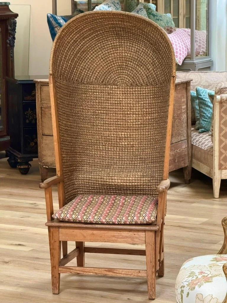Rare Oak and Rush Orkney Chair, Scotland, 18th century, hooded with a woven curved back above a solid seat with a custom cushion,ht. 55, wd. 25, dp. 18 in.

