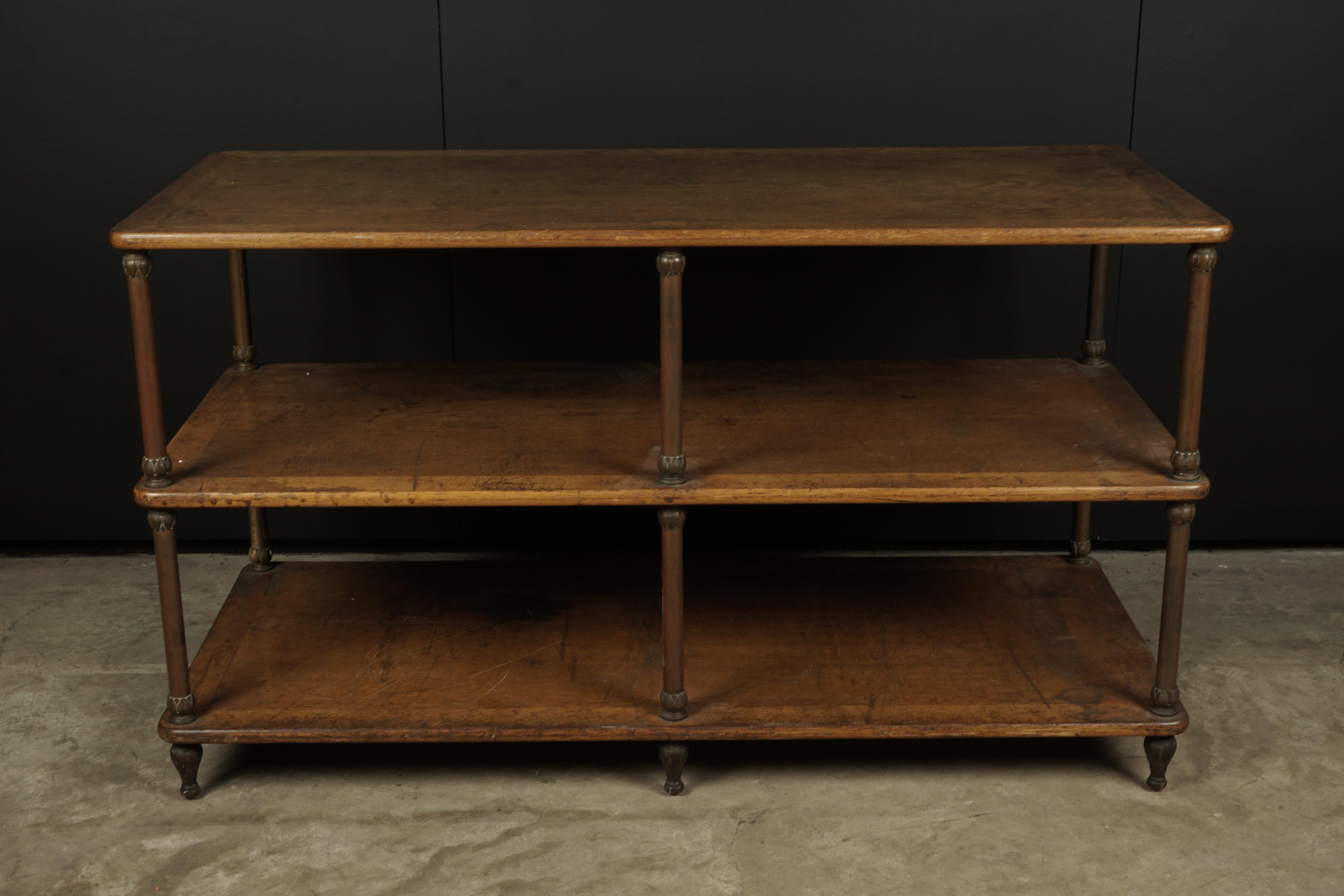 Rare oak console table from a Haberdashery, France, 1900s. Solid oak and steel construction. Fantastic wear and patina.