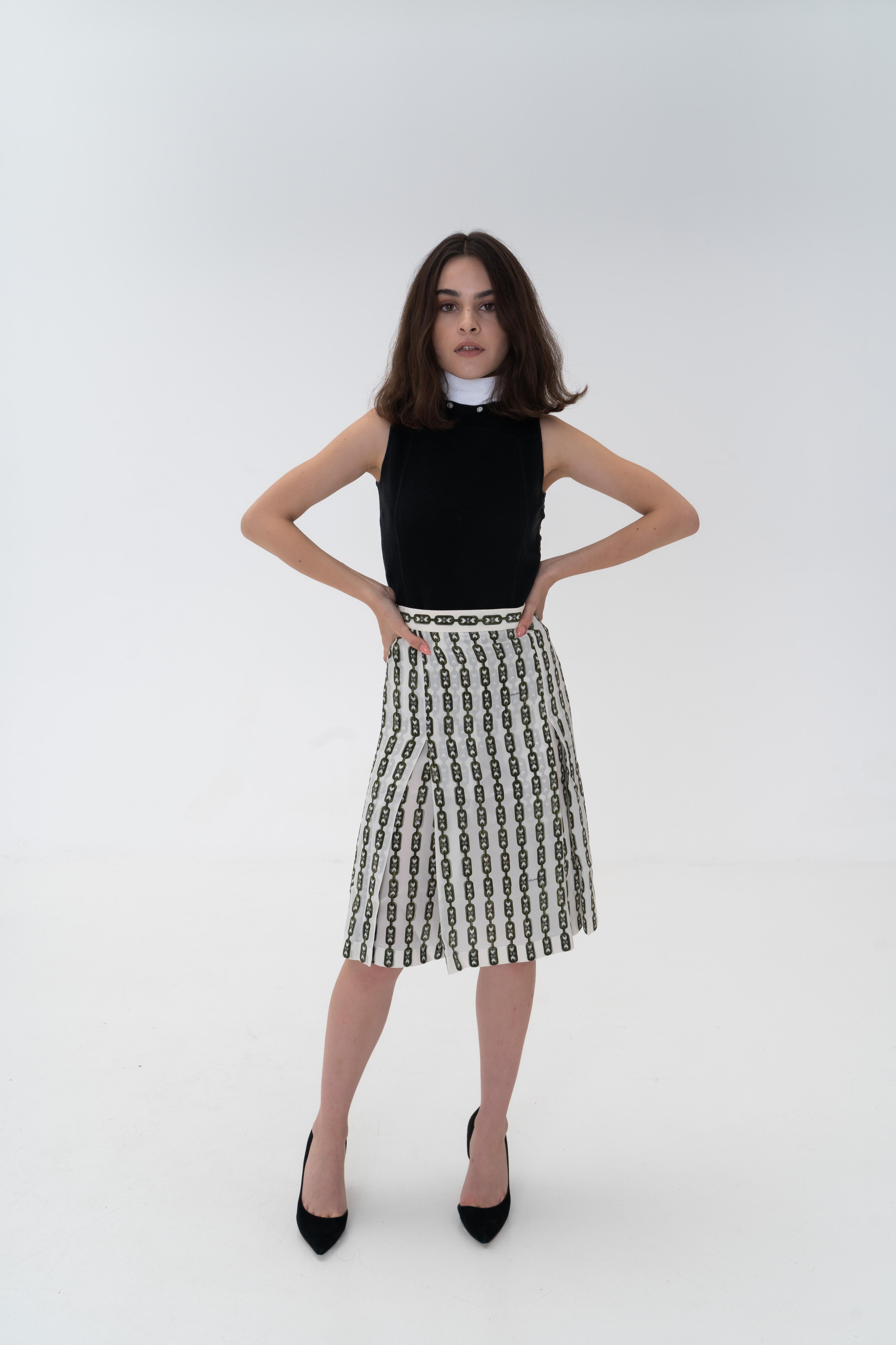 Rare! Old Celine by Phoebe Philo Horsebit Skirt logo monogram chains  2016
Céline by Phoebe Philo 
Country of production: France
Celine Marked Size: FR 42 US 12 IT 46
Celine style: 2 2J16 / 5160
Dimensions Celine:
Celine Skirt Length: Up to Lace: 59