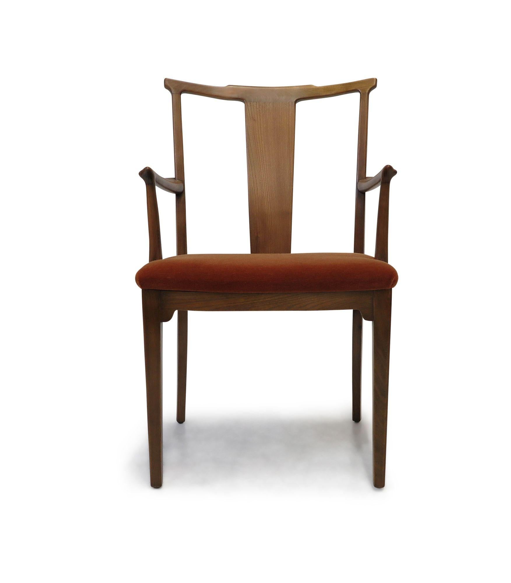 Pair of Ole Wanscher armchairs,1938, Denmark. Each chair is handcrafted in a sculptural form and upholstered in mohair. These armchairs provide comfort and distinction, bringing a statement of elegance to any decor. The chairs are fully restored and