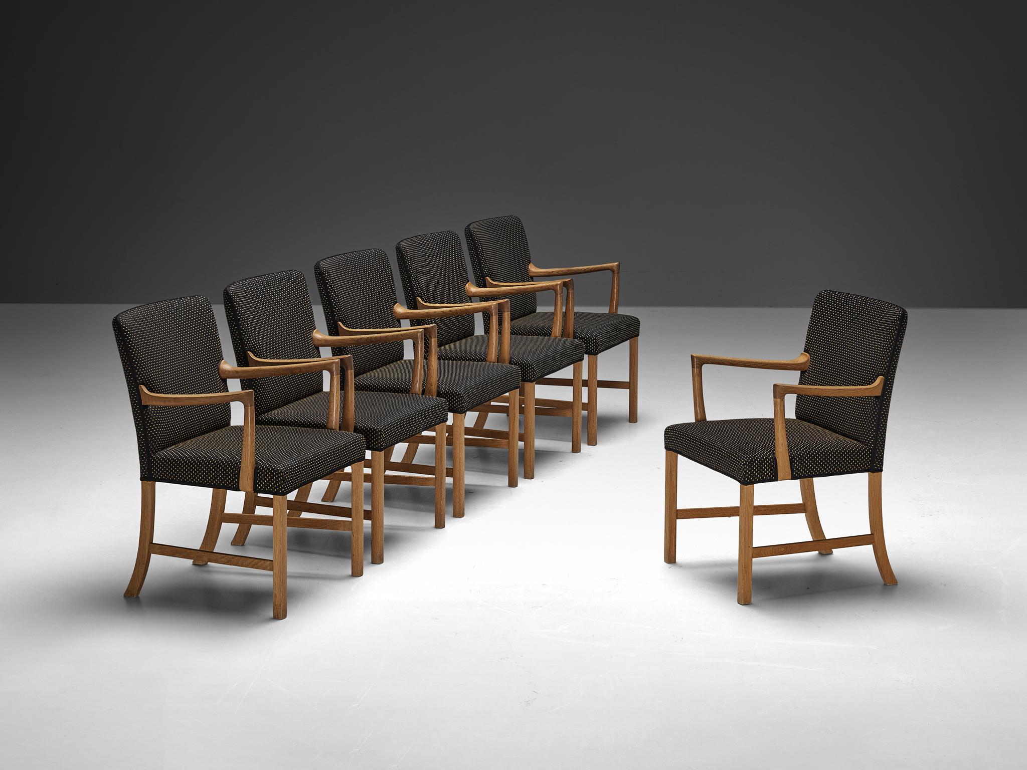 Ole Wanscher for A.J. Iversen, set of six armchairs, model 'J3063', oak, fabric, Denmark, 1960s

A rare set of mid-century dining chairs model J3063 crafted by Ole Wanscher. Drawing inspiration from an early 1944 design by the master for A.J.