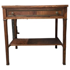 rare Olivewood side table with decorative hardware.