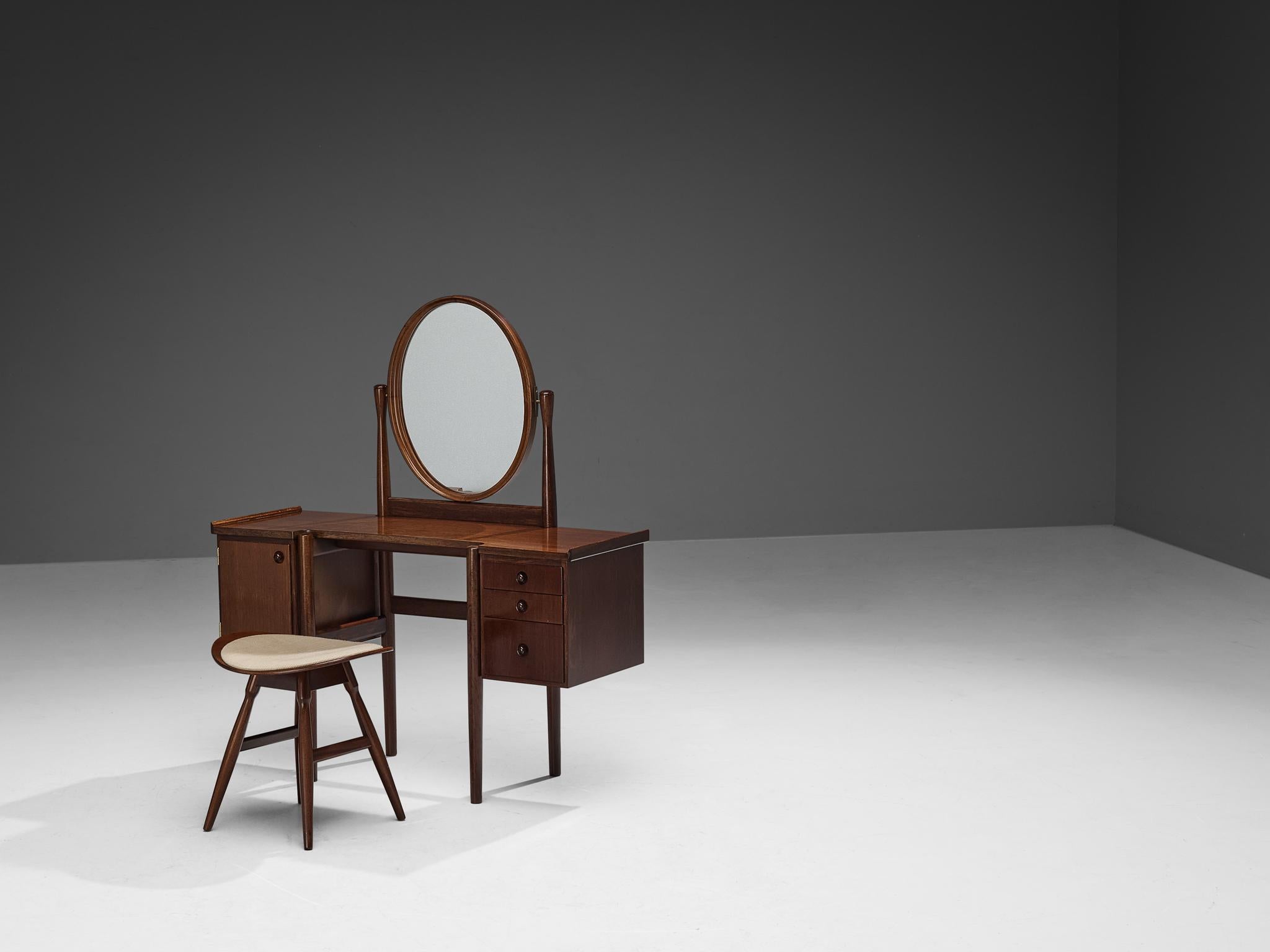 Olof Ottelin for OY Stockmann AB, Kervo Snickerifabrik, dressing table with stool, Finland, 1960s 

This elegant vanity table with stool combines simplicity with style in a superb manner. Executed in teak, this well-proportioned piece embodies a