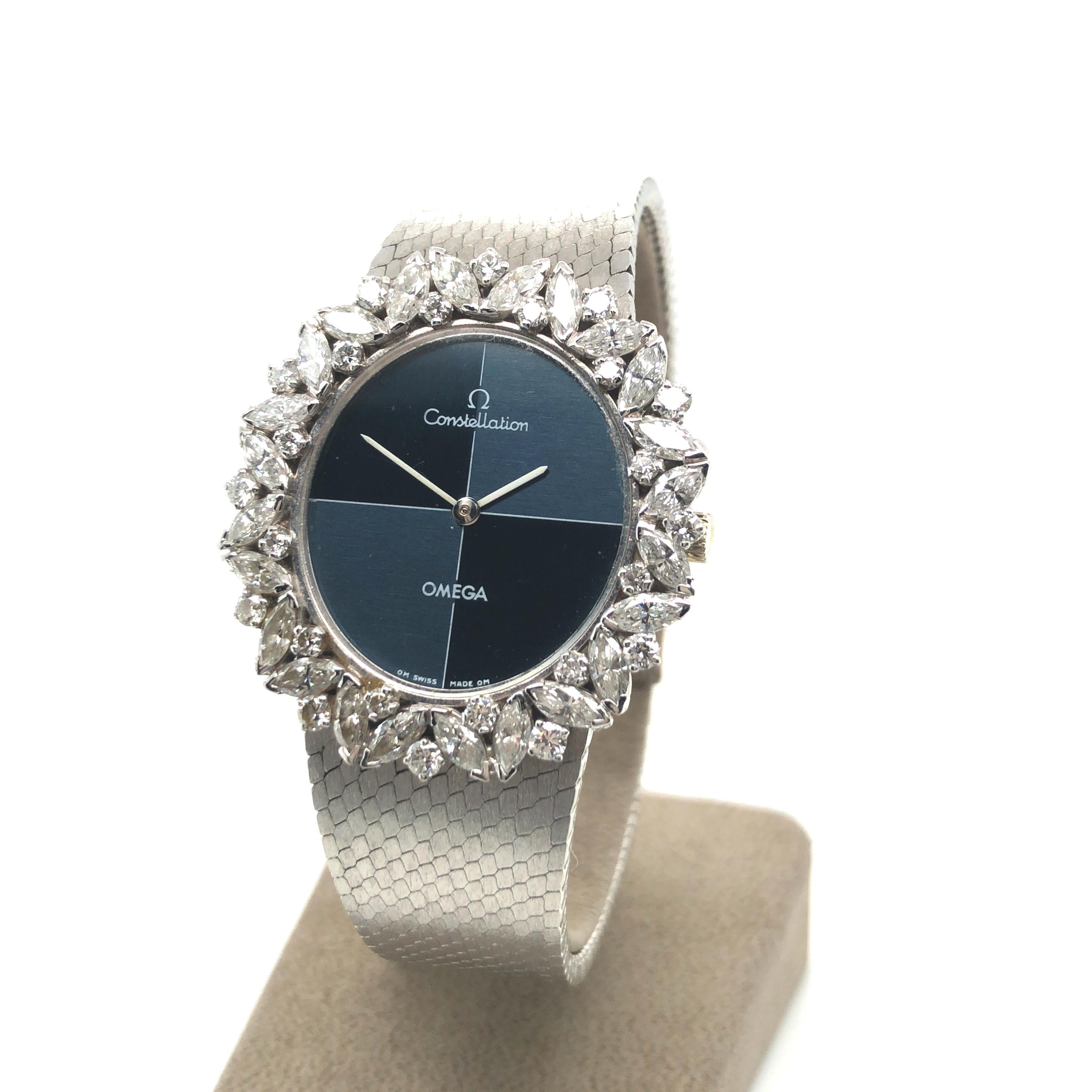 The Constellation is one of Omegas oldest collections.
This one is a very beautiful example, the bezel is set with 24 marquise-cut diamonds and 24 brilliant-cut diamonds totalling 1.80 ct. The colour of the dial quarters is depending on the