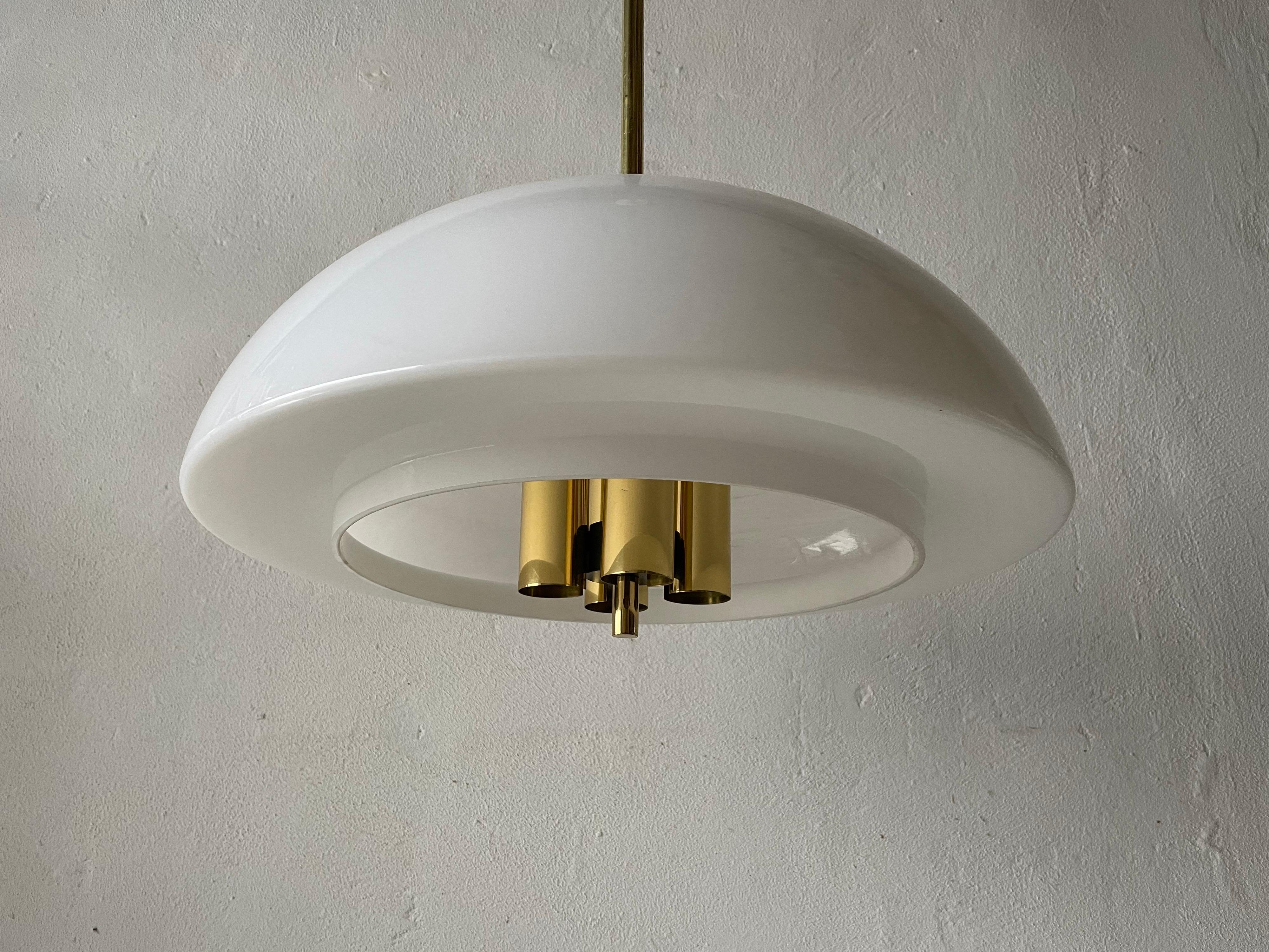 Rare opaline glass & brass lux pendant lamp by Limburg, 1960s, Germany

Lampshade is in very good vintage condition.

This lamp works with 4 x E27 light bulbs. 
Wired and suitable to use with 220V and 110V for all