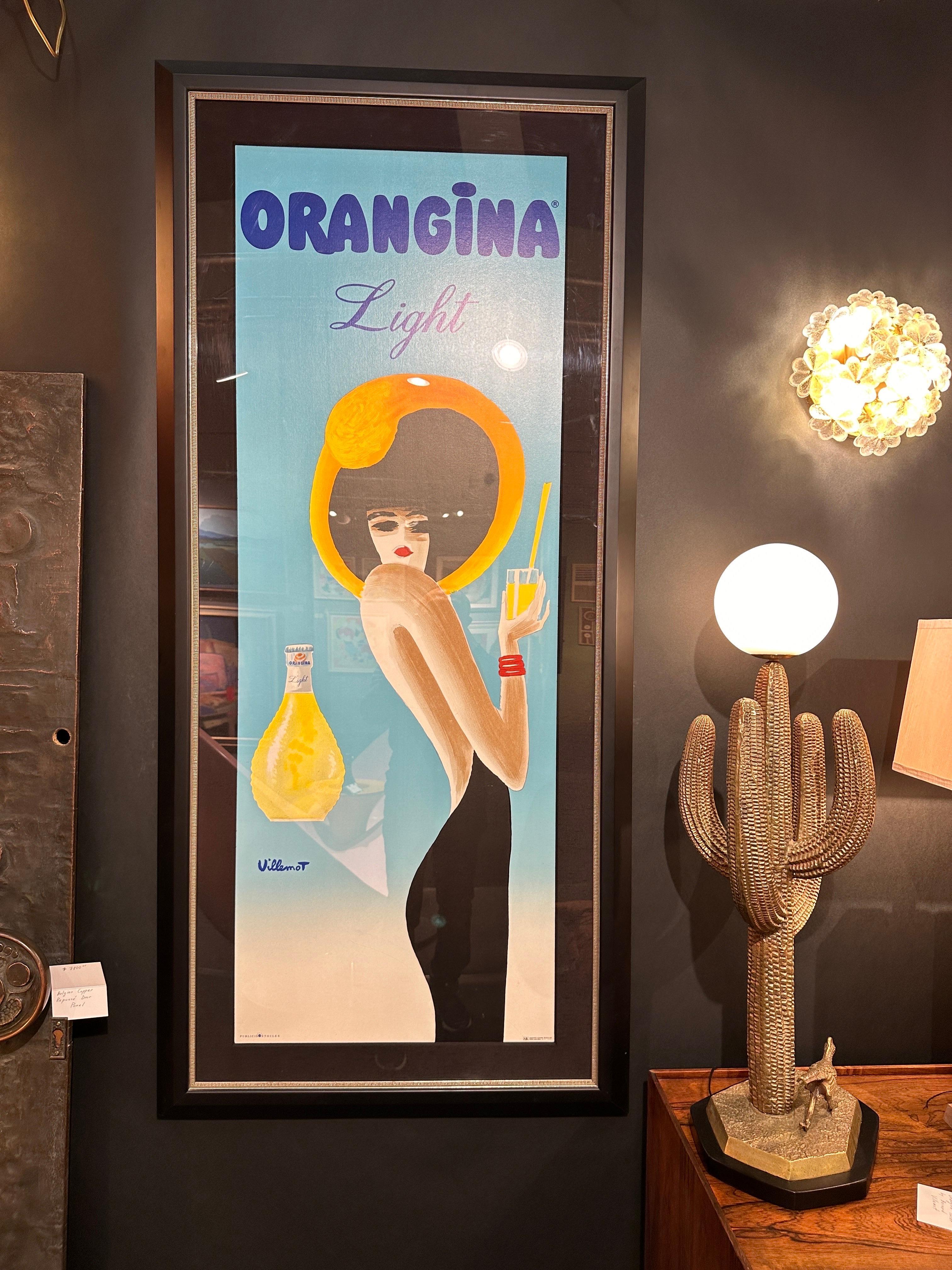 Rare framed “Orangina” poster by French artist Bernard Villemot. Poster is linen backed and protected under acrylic sheet. Frame is mat black with silver trim.