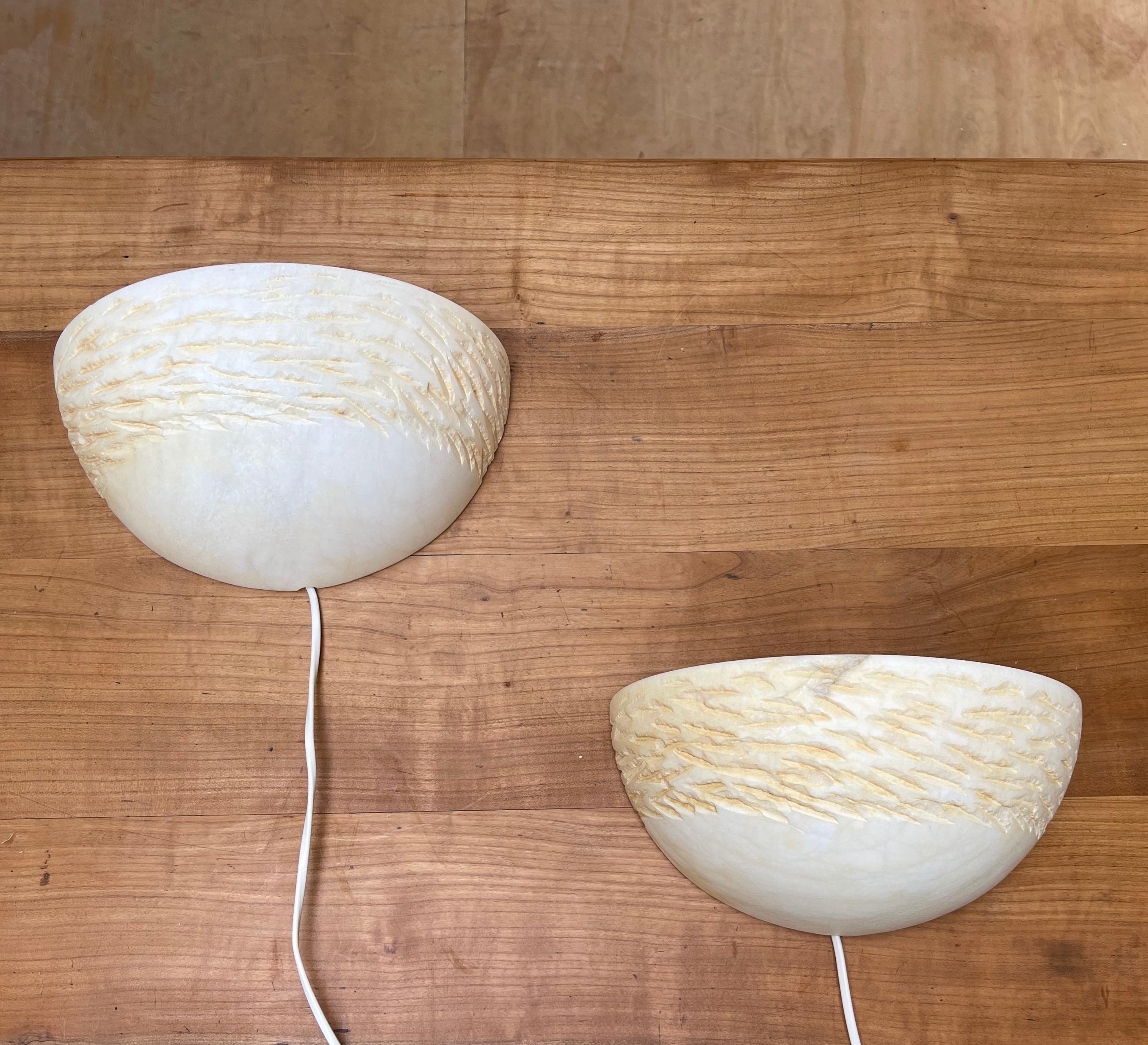 Unique, hand carved organic design, midcentury wall lamps.

If you are looking for a stylish way to bring light into your entry hall, bathroom, kitchen or bedroom or if you are looking for the perfect wall lights over your side table or sideboard