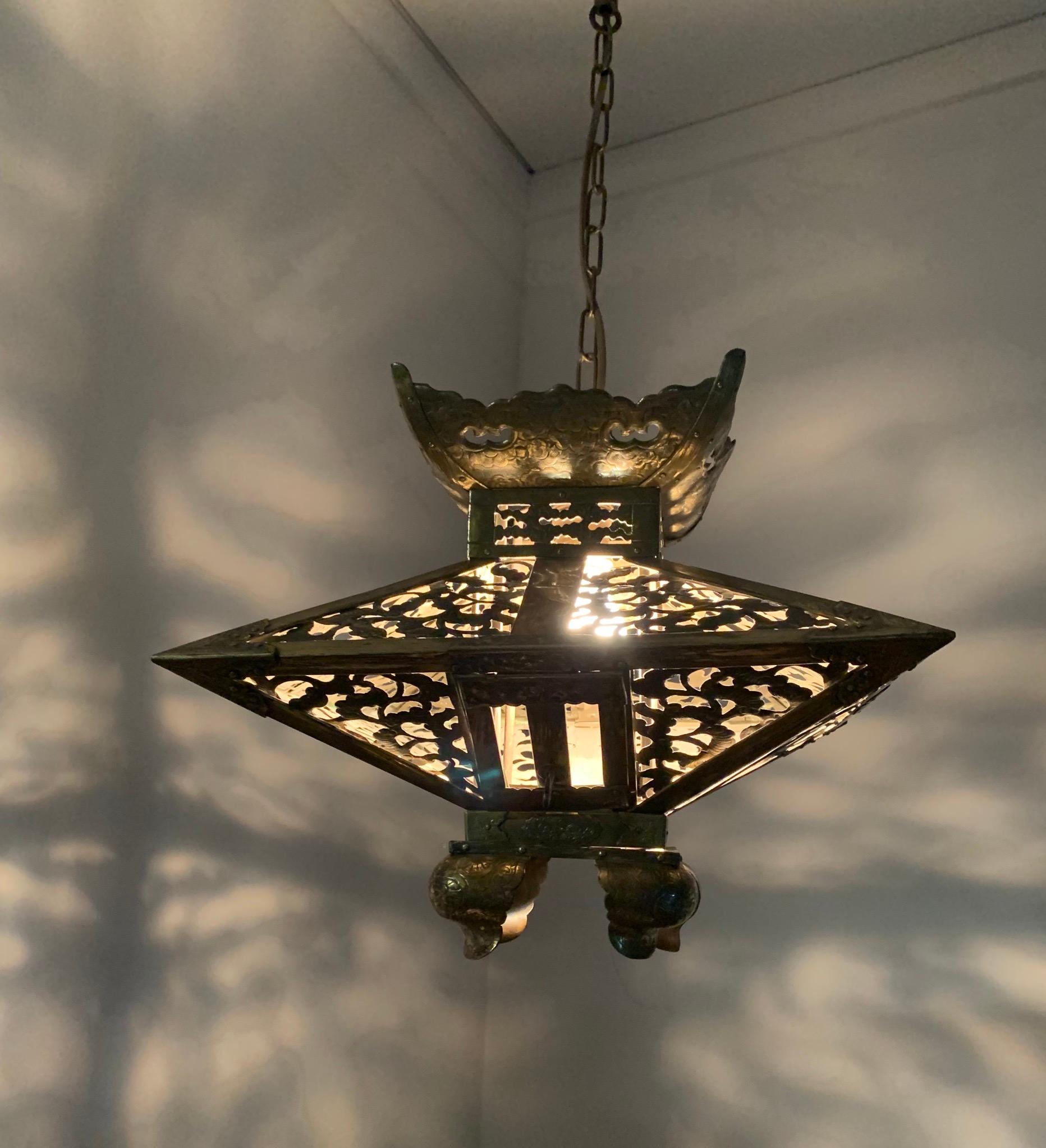 One of a kind, early 1900s Arts and Crafts light fixture.

This antique and extraordinary pendant is another one of our recent, great finds. If you are decorating a room with an oriental theme then this unique, single light pendant should be on your