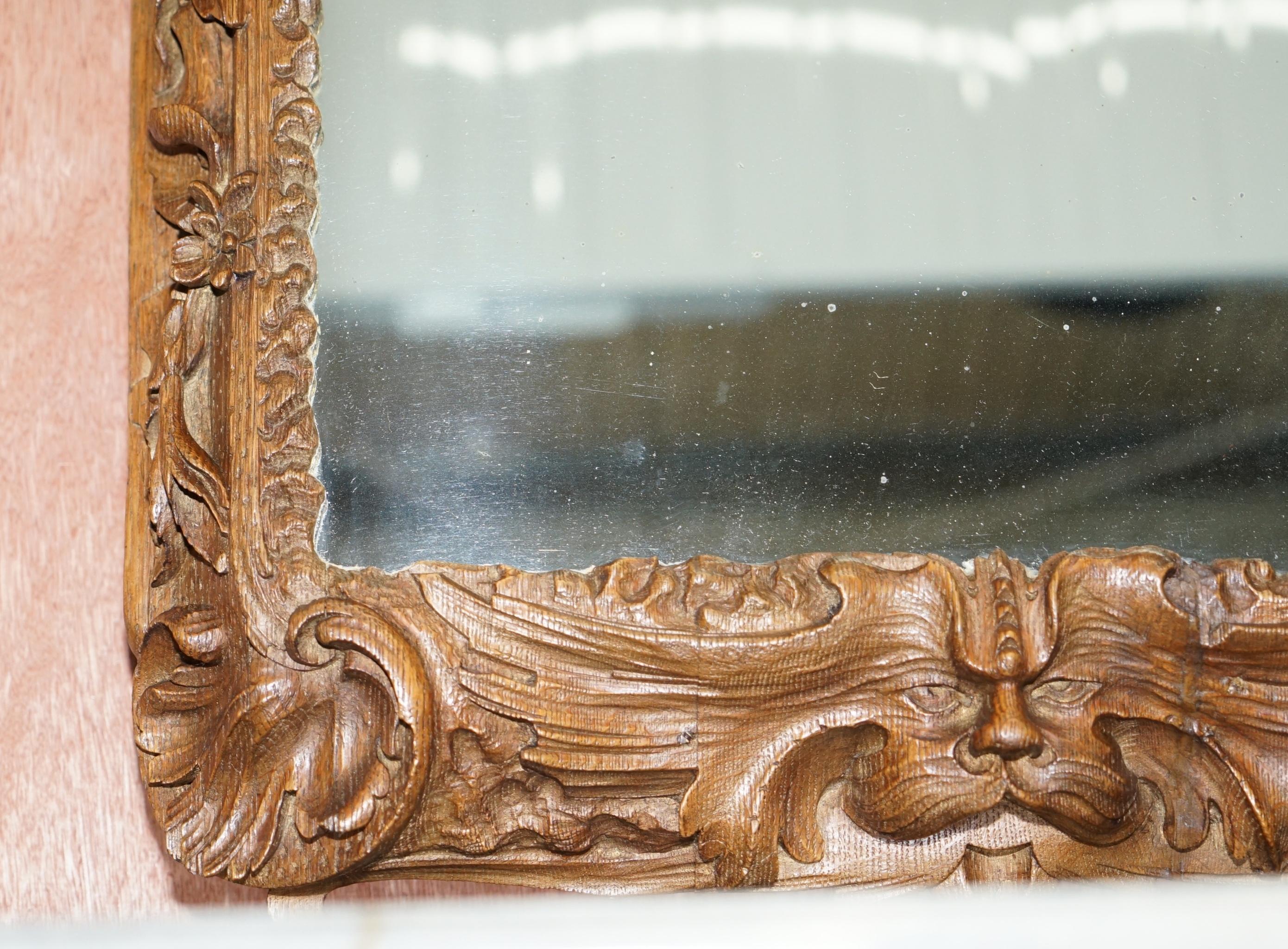 Rare Original 18th Century Ornately Carved Frame Wall Mirror with Cherub Boy For Sale 4