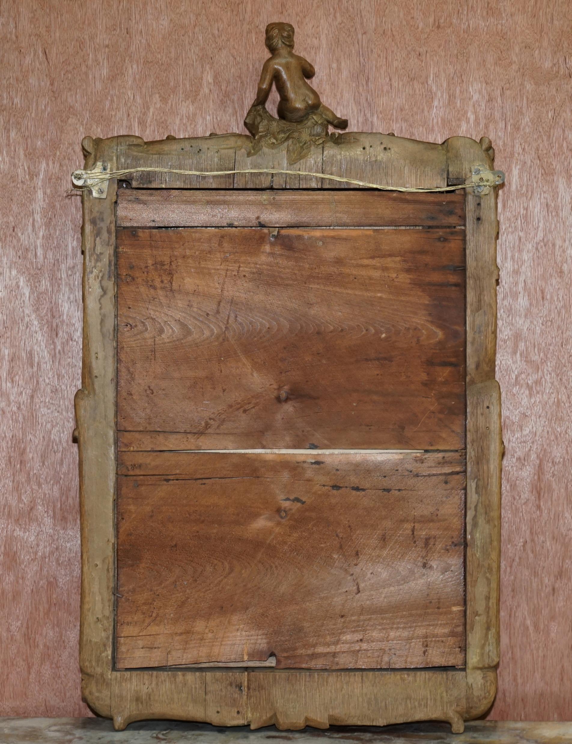Rare Original 18th Century Ornately Carved Frame Wall Mirror with Cherub Boy For Sale 5