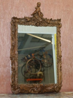 Rare Original 18th Century Ornately Carved Frame Wall Mirror with Cherub Boy
