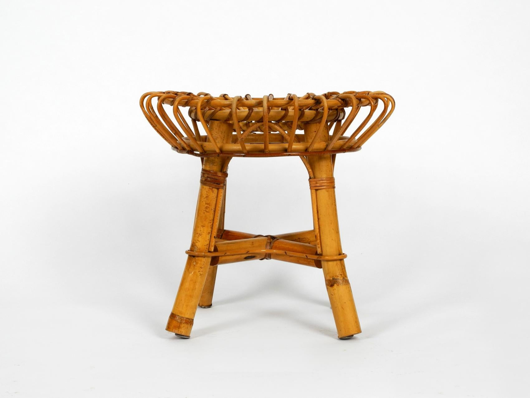 Rare original 1960s bamboo stool with 4 legs. Attributed to Janine Abraham and Dirk Jan Rol.
Made in France. Beautiful design and very comfortable.
Completely made of bamboo, a very elaborate production.
A Classic with great seating comfort.