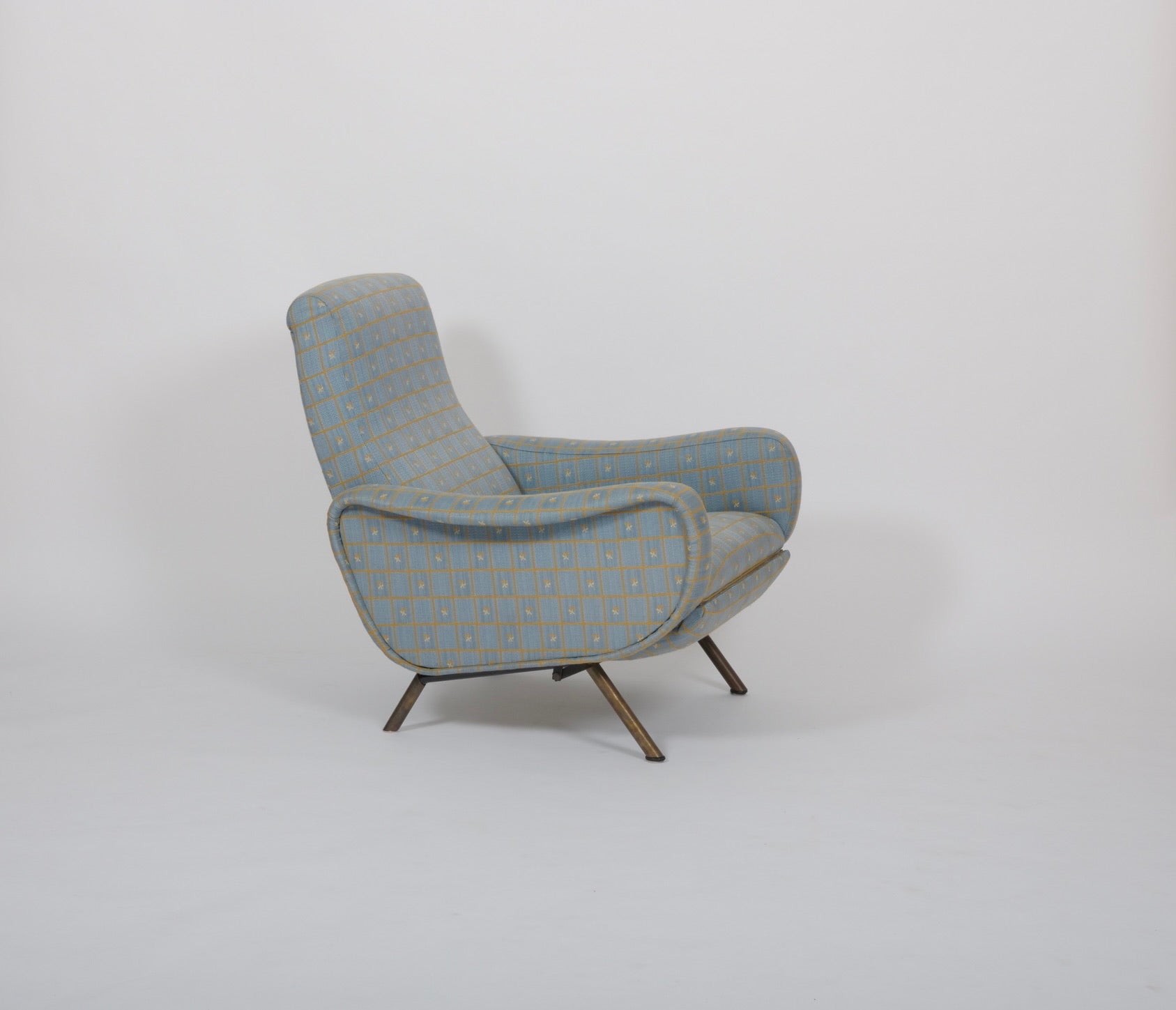 A pair of original Marco Zanuso reclining 'Lady' chairs. Italy c1950 
Original upholstery. 

If you would like us to re upholster this can be arranged. 

