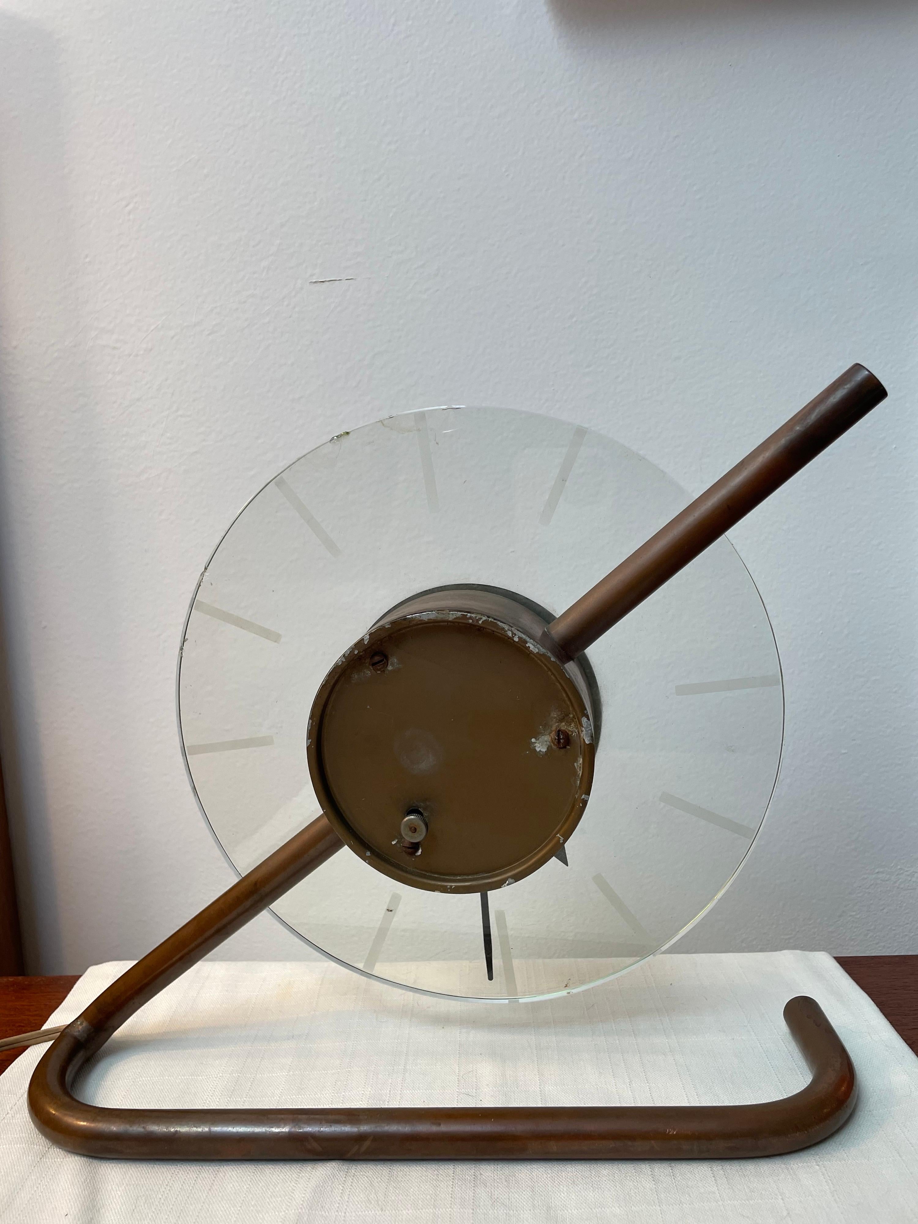 Incredibly Rare and Original Prototype Z clock, designed by Gilbert Rohde for Herman Miller, circa 1933. This design has been included in every major museum exhibition on American Art Deco, and is featured in numerous books. Needs a new motor.
