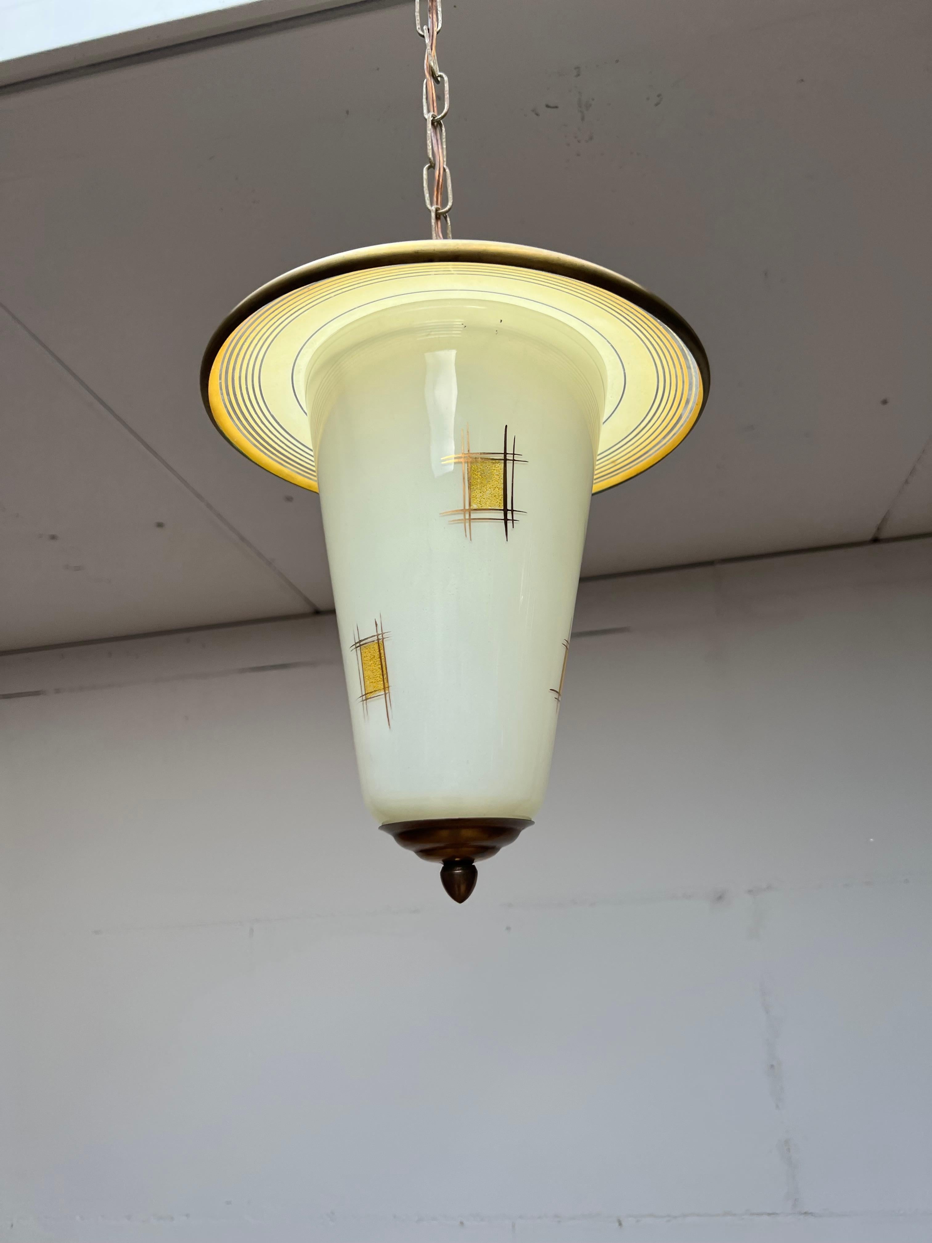 Handcrafted and stylish Mid-Century Modern lantern or ceiling lamp for your stairwell, hallway or bedroom.

This all handcrafted, practical size and beautiful looking ceiling lamp is another one of our recent great finds. The beautiful overal