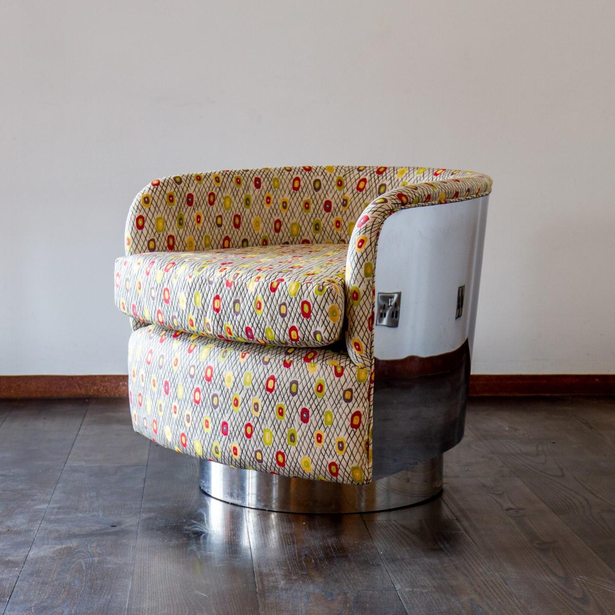 Sensational single Milo Baughman designed upholstered swivel and tilting metal wrapped tub chair, upholstered in a luxurious and colourful patterned jacquard fabric (woven with Silk, Linen and Cotton)  1970s 

This model rarely comes to the market.