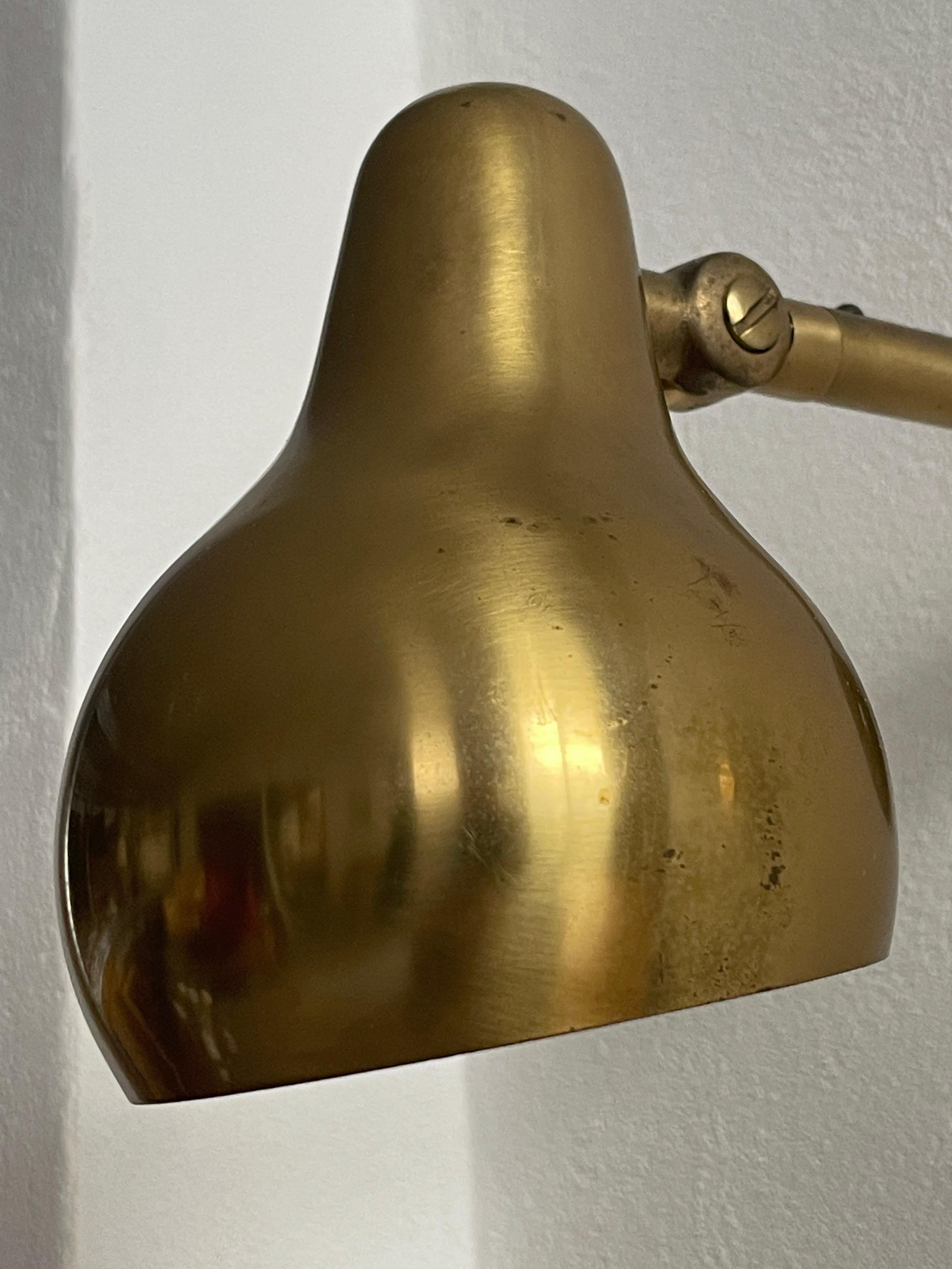 Rare Original Pair of 1940s Wilhelm Lauritzen wall lights in patinated brass. For Sale 9