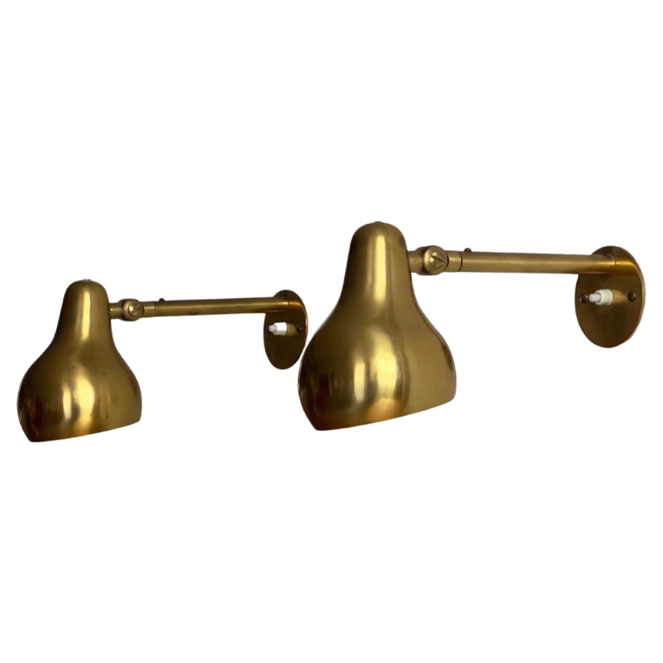 Rare Original Pair of 1940s Wilhelm Lauritzen wall lights in patinated brass. For Sale
