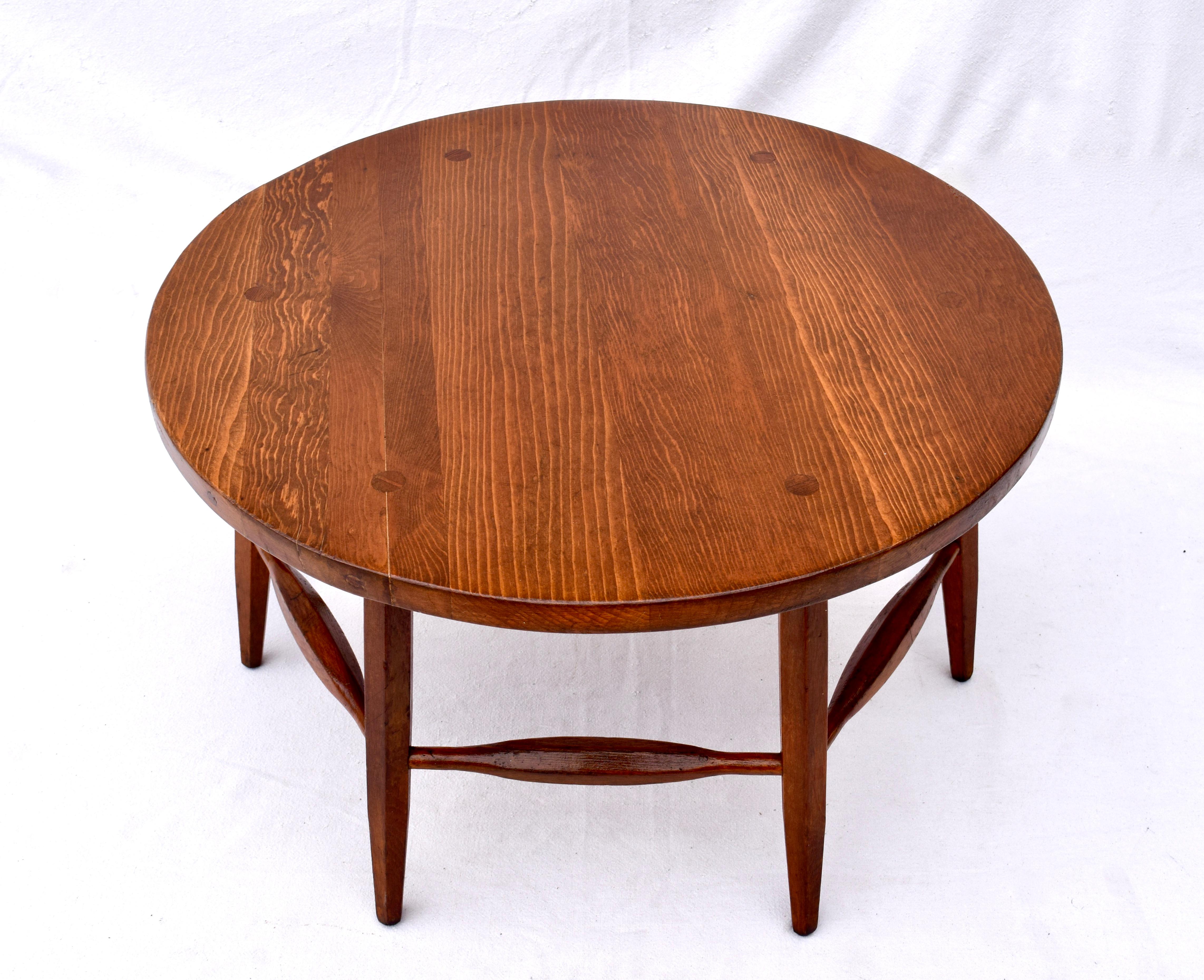 Rare round Monterey California red Adler coffee table with through mortise and Tenon chamfered legs and stretchers. Branded MONTEREY under the top. Classic American Northwest Mission style. Highly collectable of limited production from the early