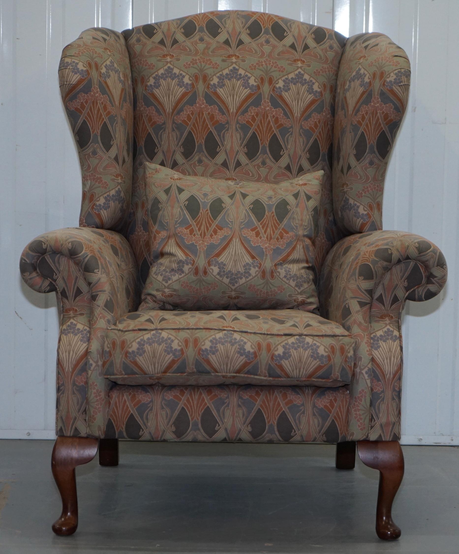 We are delighted to offer for sale this lovely large original vintage Liberty London wingback armchair with Inathe upholstery

This chair is a very rare find, its not that rare to find seating upholstered with Liberty’s most famous fabric which