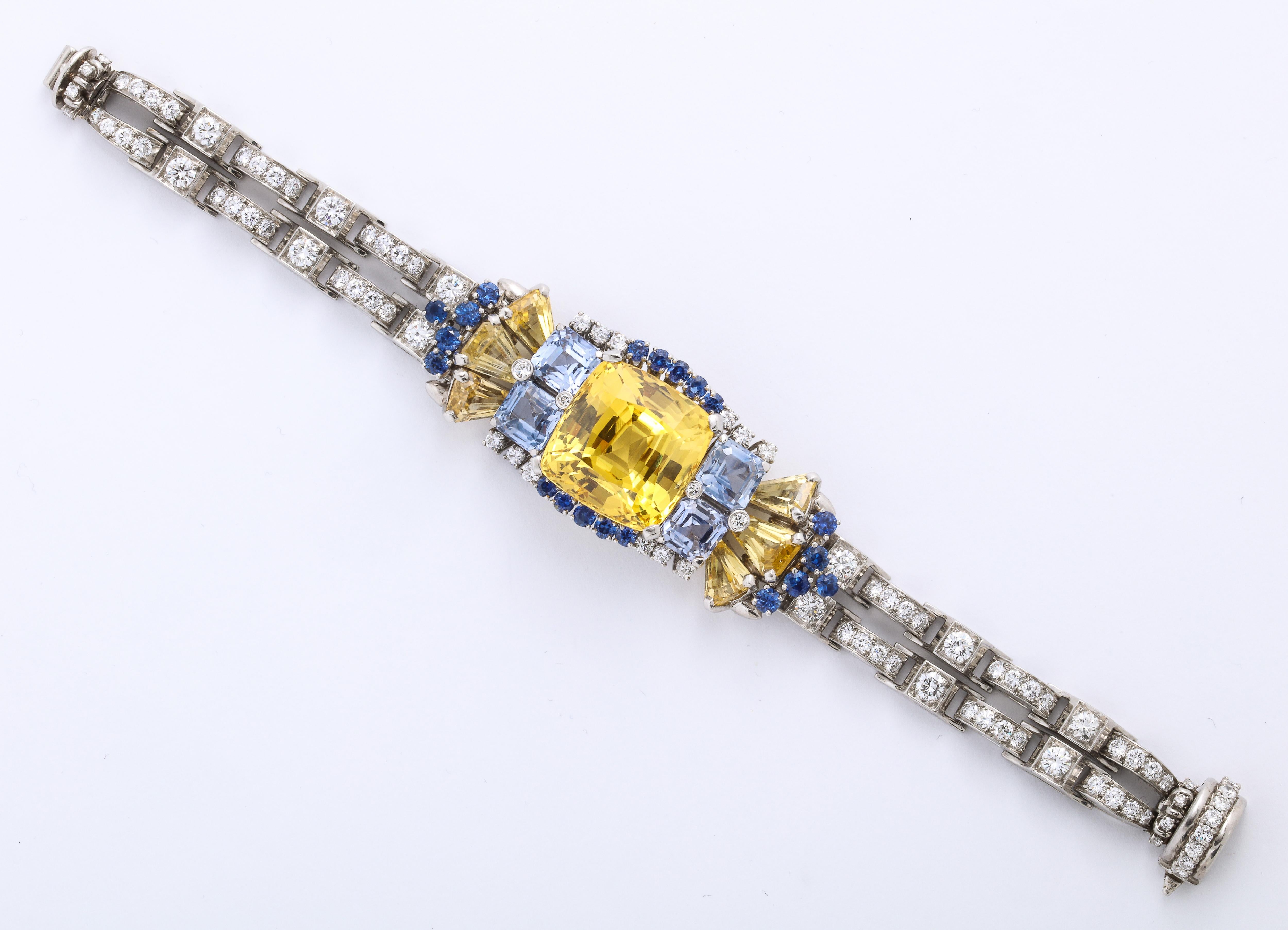 Over the top exquisite one of a kind original Authentic Oscar Heyman Bros Diamond, Platinum bracelet; with an Unheated 41.47 Carat yellow Sapphire center stone 


Oscar Heyman & Bros Platinum Bracelet 
Total wight 73 Grams 
Yellow Sapphire 41.47