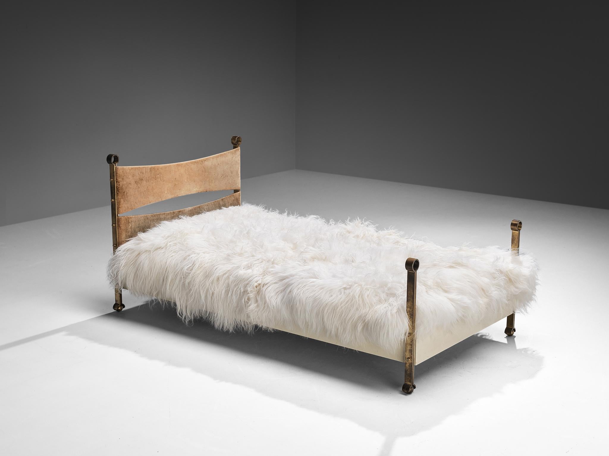 Osvaldo Borsani, single bed, model L79, brass, lacquered wood, fabric, Italy, 1963. 

This eccentric single bed is designed by Osvaldo Borsani and embodies a splendid construction of subtle lines and curvaceous shapes. Remarkable detail and the