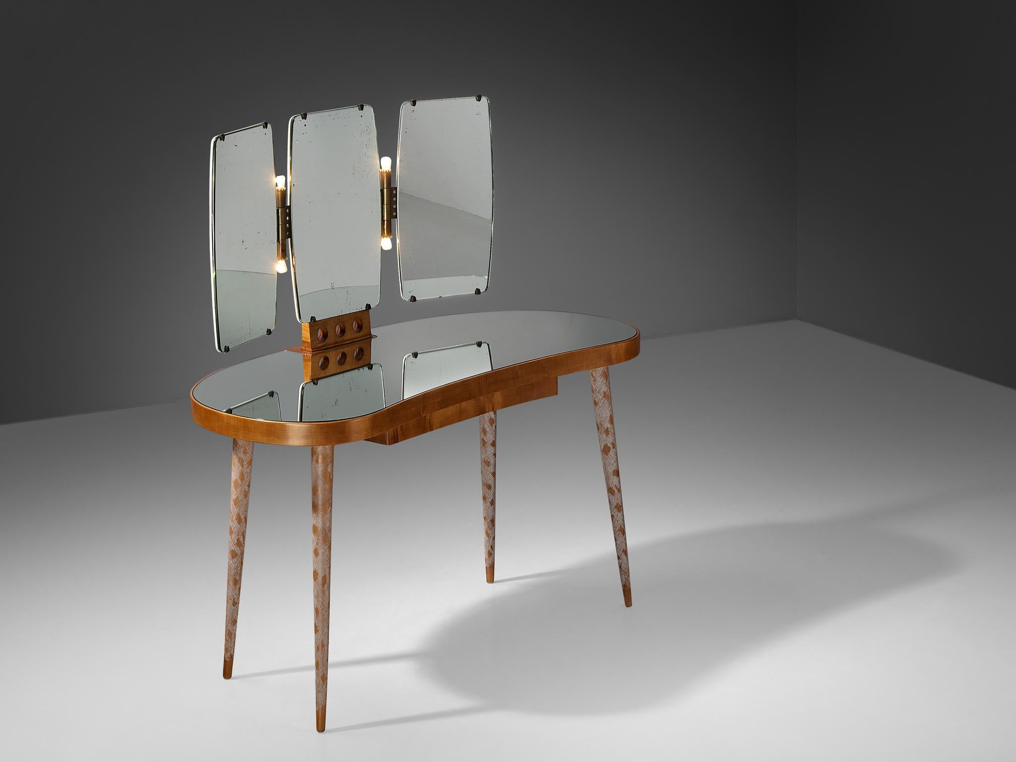 Osvaldo Borsani for Arredamenti Borsani Varedo, dressing table, model '6142', maple, brass, mirrored glass, lacquered wood, Italy, 1943

An exquisite and truly exceptional vanity table designed by the Italian Osvaldo Borsani, dating back to around