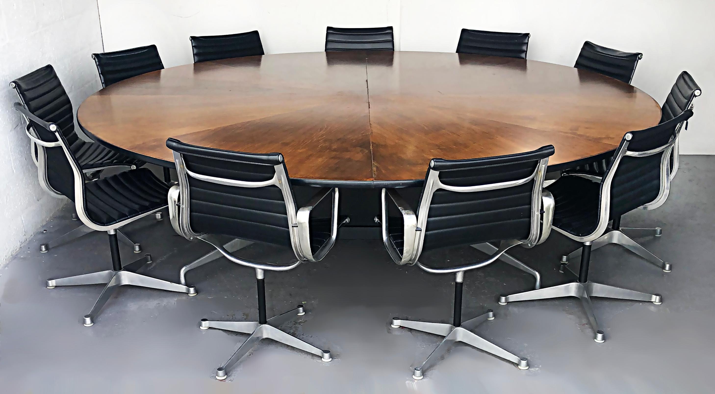 Rare Overscale Herman Miller Eames aluminum group table 

Offered for sale is a rare and outstanding Herman Miller Charles and Ray Eames Aluminum Group Conference/Dining Table c1965. The table is constructed from walnut, aluminum, enameled steel,