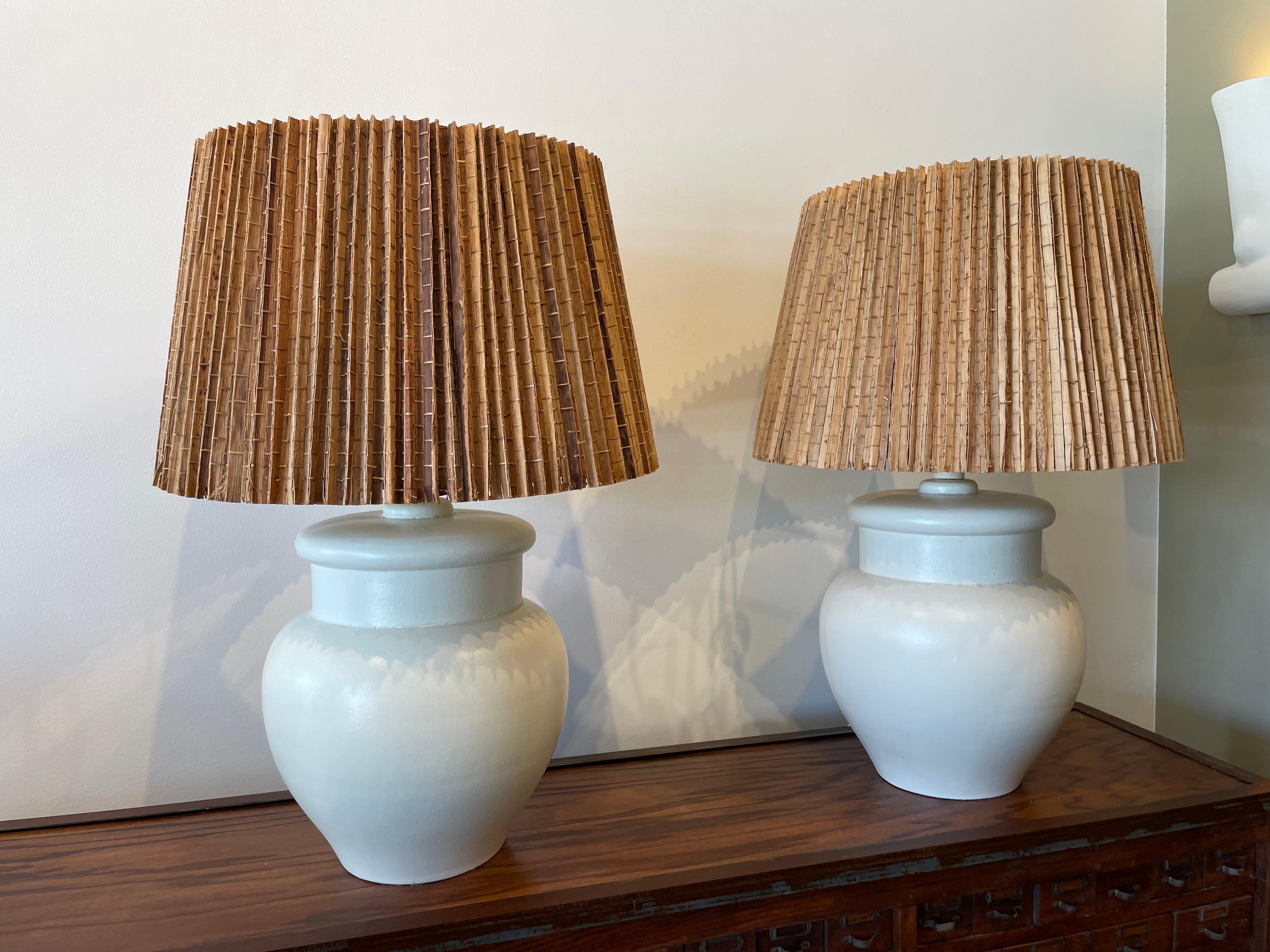 OVERSIZED cream tone biscuit ceramic table lamps with THE MOST AMAZING palm leaf shades which are included in your purchase. NOTE: shade diameter 23.5 inches at widest.