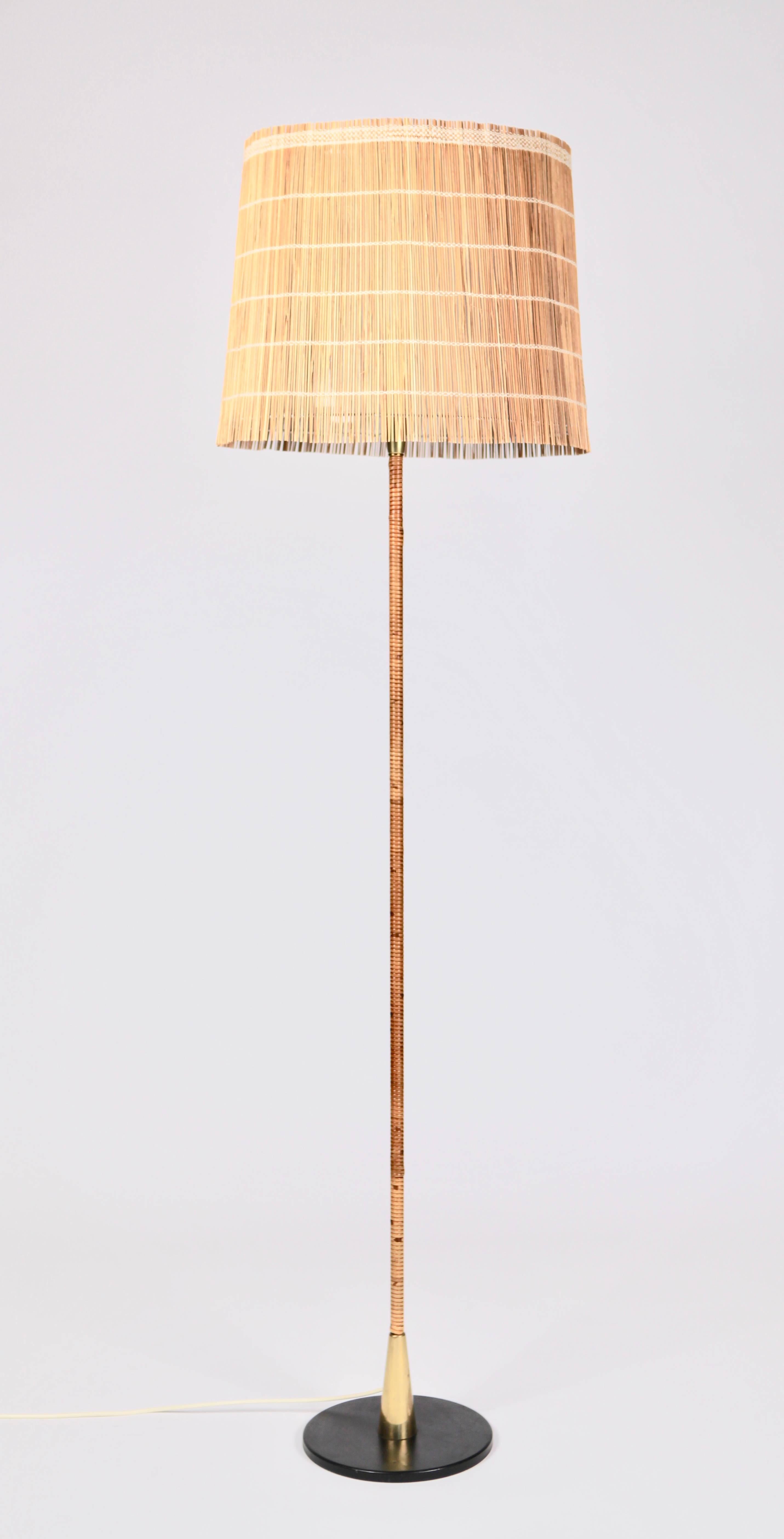 Paavo Tynell, floor lamp manufactured by Idman Oy in Finland in the 1950s.

Impressed with manufacturers label 