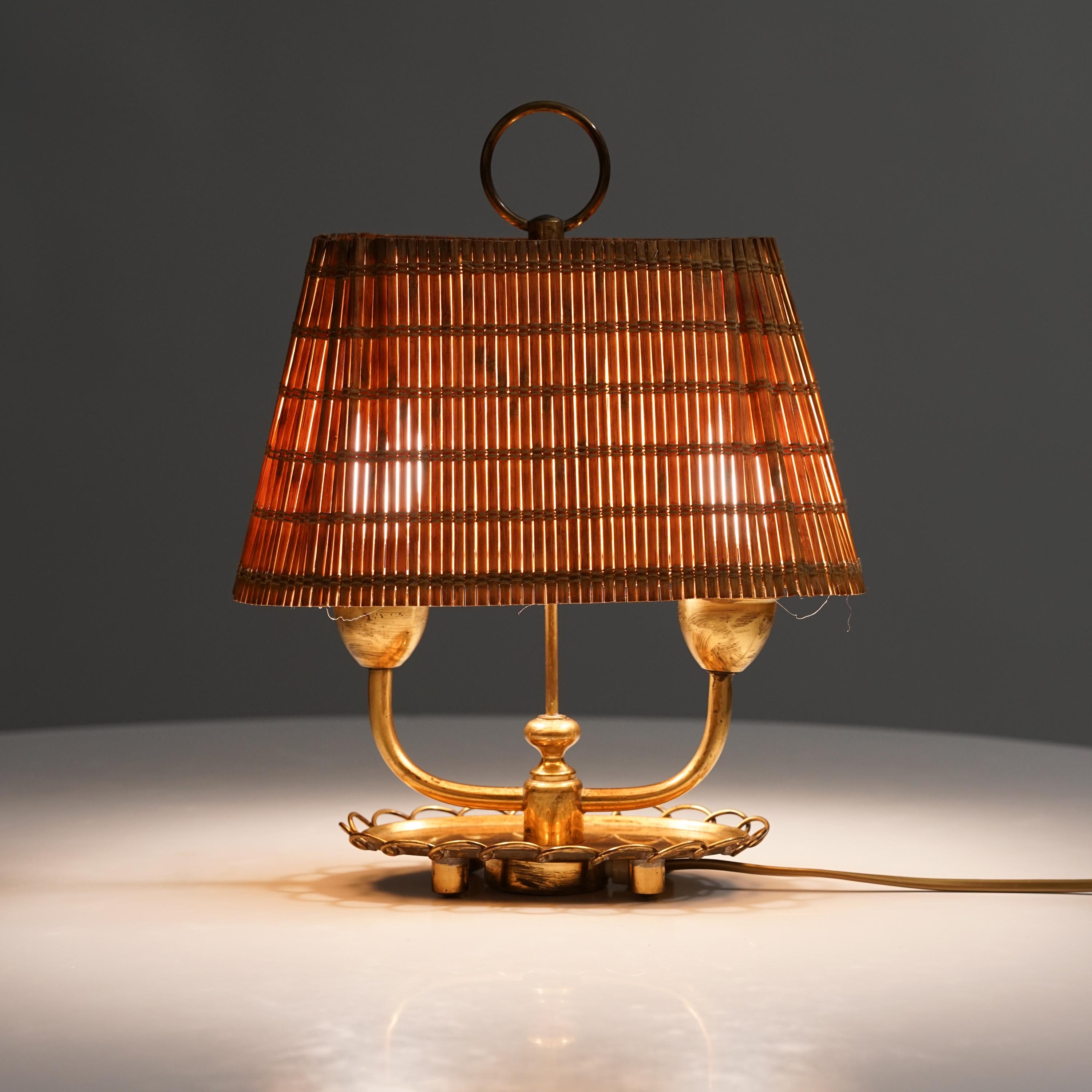 Rare Paavo Tynell Style table lamp in brass and wooden teak shade from the  1940s. Solid brass. Simple and elegant design. All parts are original. Very rare lamp example in Finland. 