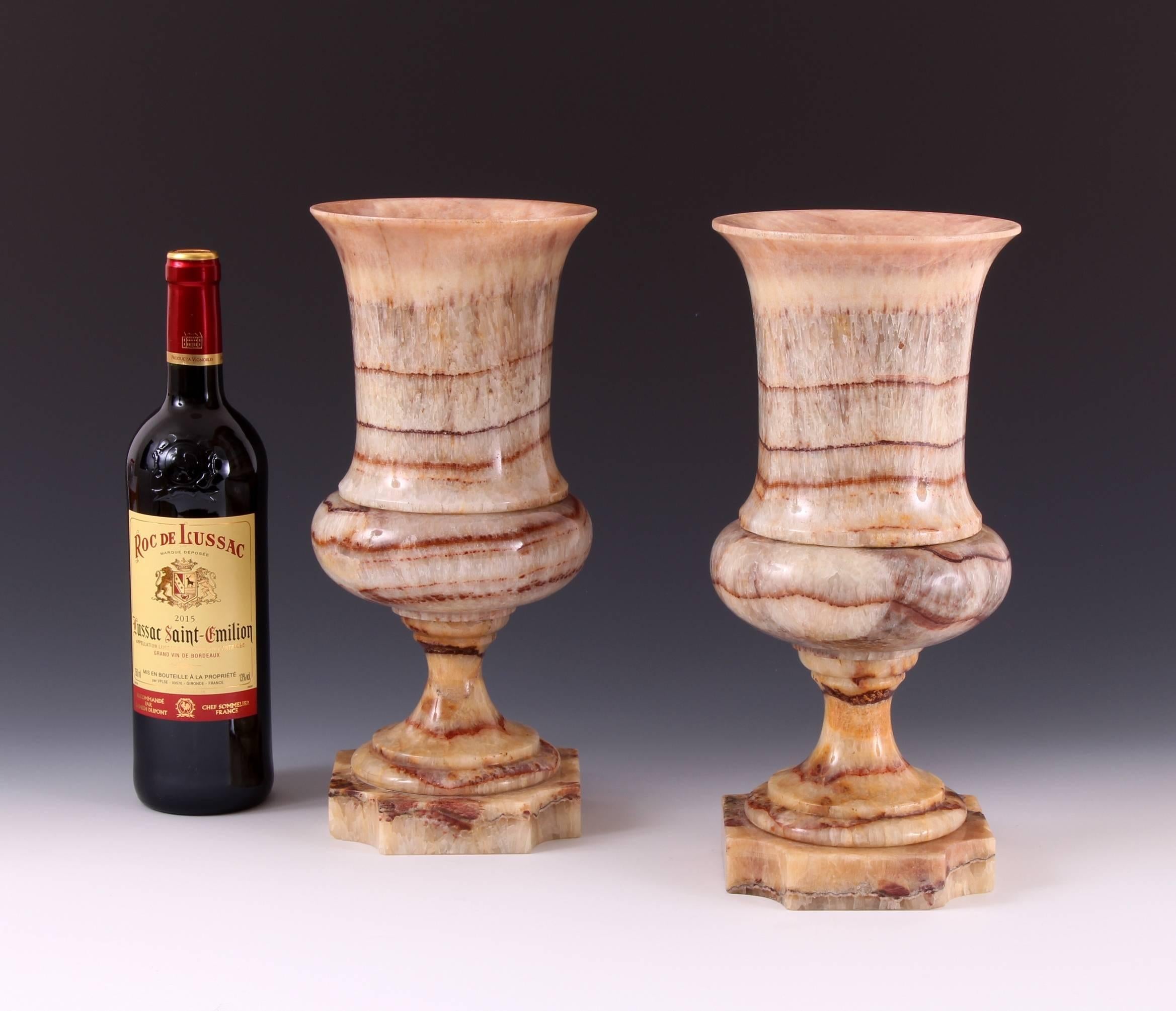 Incredibly rare pair of 19th century Campana shaped fluorspar vases. This large and well proportioned pair have been crafted into the most elegant of ancient form. The scarcity of this type of Fluorspar cannot truly be overstated, the classical