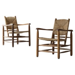 Rare pair Chamrousse armchairs by Charlotte Perriand / Steph Simon, France 1940s