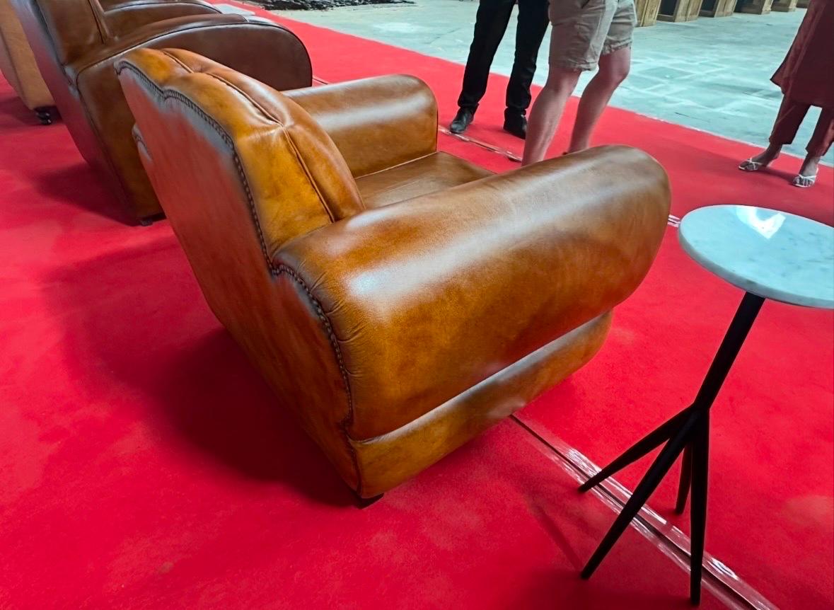 Pair Distressed Cognac Leather French Art Deco Mustache Cigar Club Chairs In New Condition For Sale In Swedesboro, NJ
