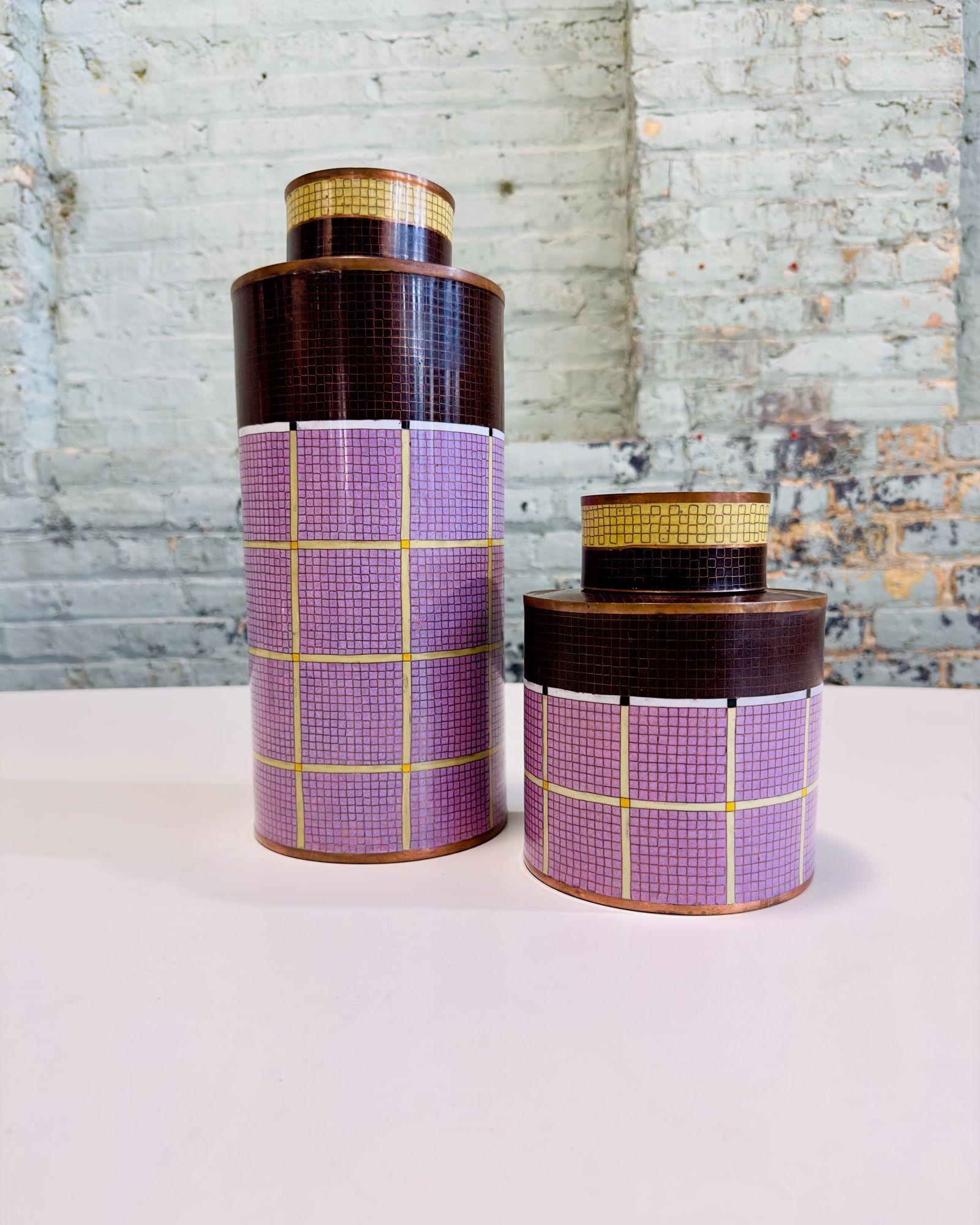  
Rare Pair Fabiennenn Jouvin Geometric enamel on copper Cloisonne Ginger Jars, 1970. Jars are enameled in brown, yellow and lavender design. Excellent condition.
The Fabienne Jouvin Geometric Cloisonné Ginger Jar is a product from Fabienne Jouvin,