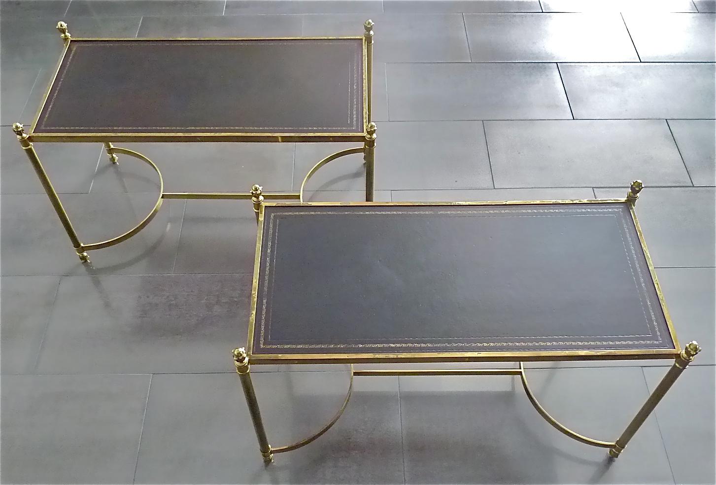 Rare and large pair of elegant rectangular French Maison Jansen attribution Mid 20th Century gilt patinated brass side, sofa, couch or end tables with original embossed brown leather tops with faint red golden leaf band ornament, Paris, France circa