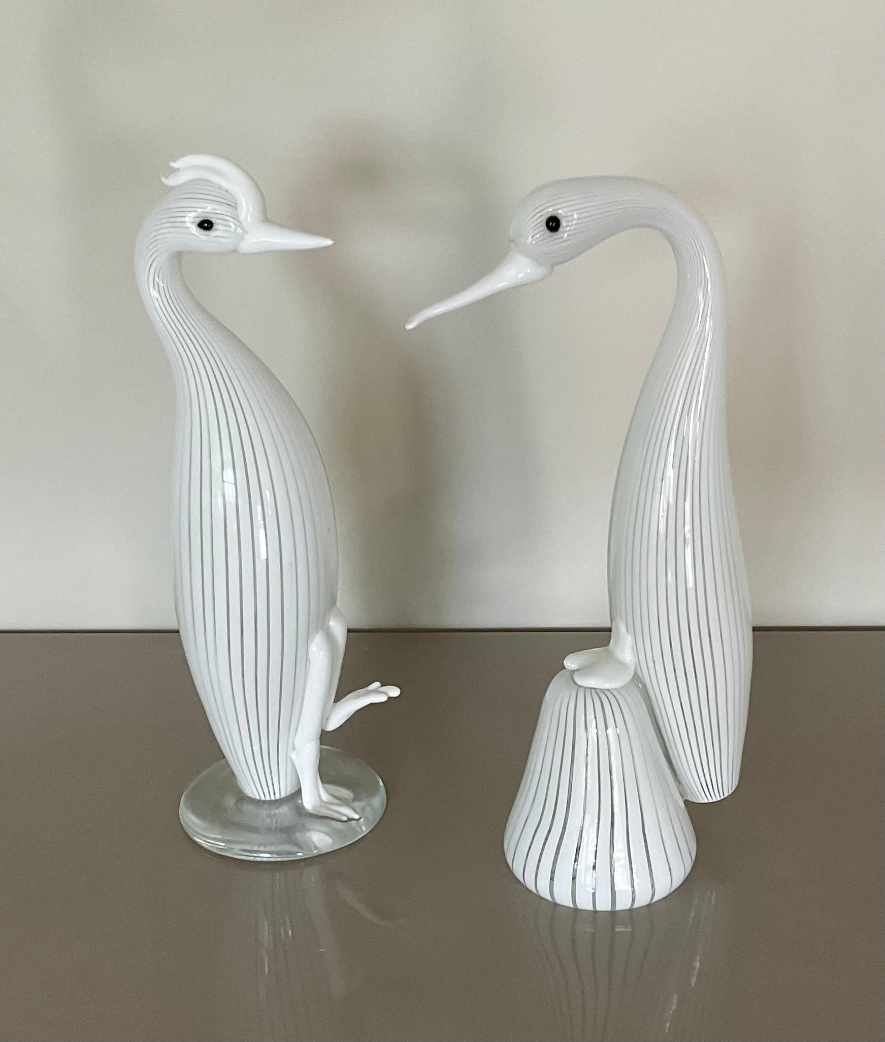 Rare pair of Venini water birds designed by Fulvio Bianconi for Venini circa 1950s. These birds are increasingly harder to find. Both retain their original 3 line acid stamp. 1 retains its original label. Group photo shown is from the Fulvio