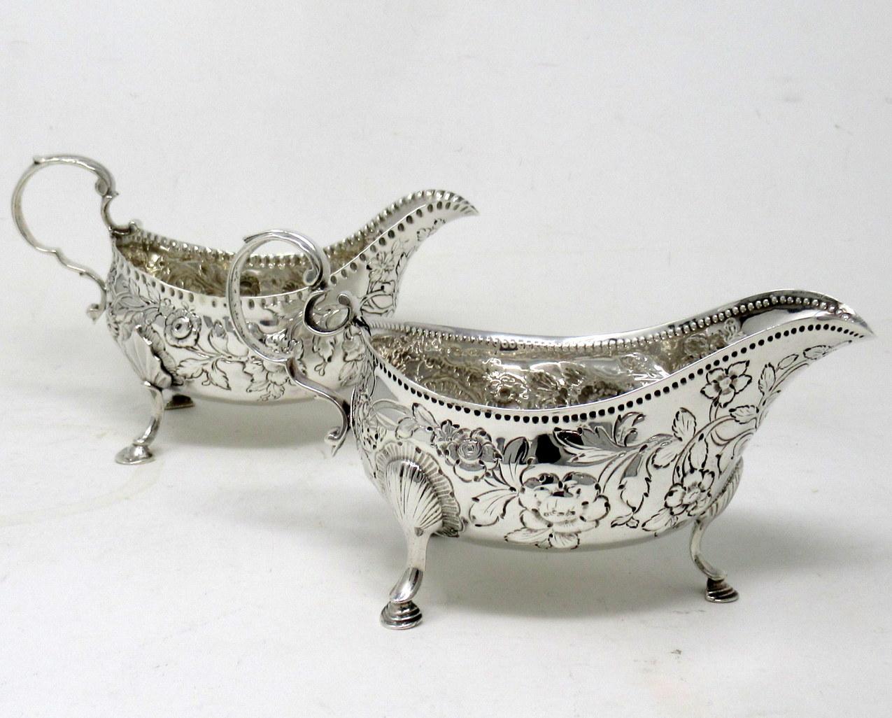 Superb Matched Pair of Heavy Gauge Irish Georgian Eighteenth Century Large Silver Gravy Boats of traditional oval form, of outstanding quality and exceptional condition for such early pieces. 

With fine beaded rim and leaf capped treble scroll